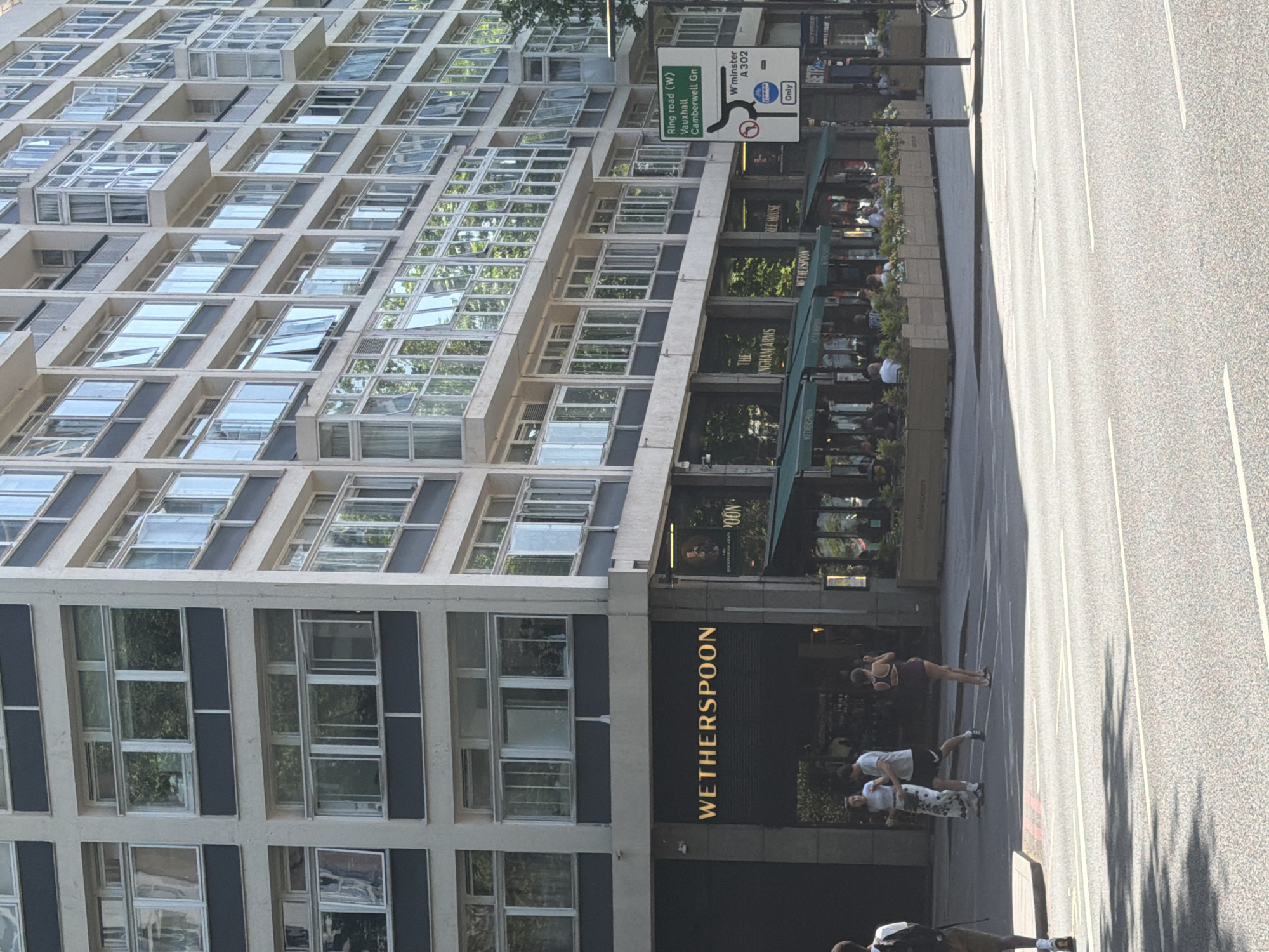 London bus makes routine stop near Wetherspoon pub