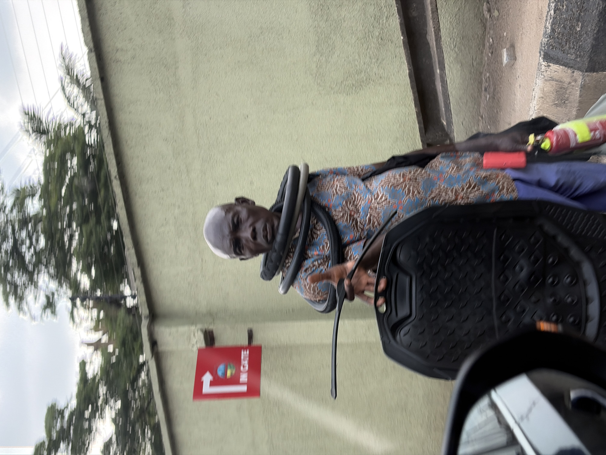 Elderly man spotted at entrance gate in Lagos