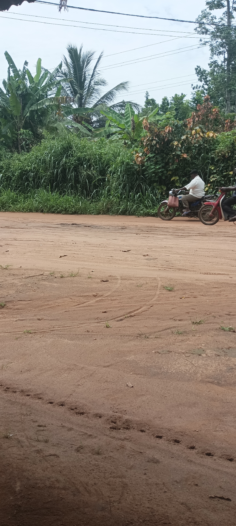 Rural Daily Life Documented on Dirt Road in Amauzu