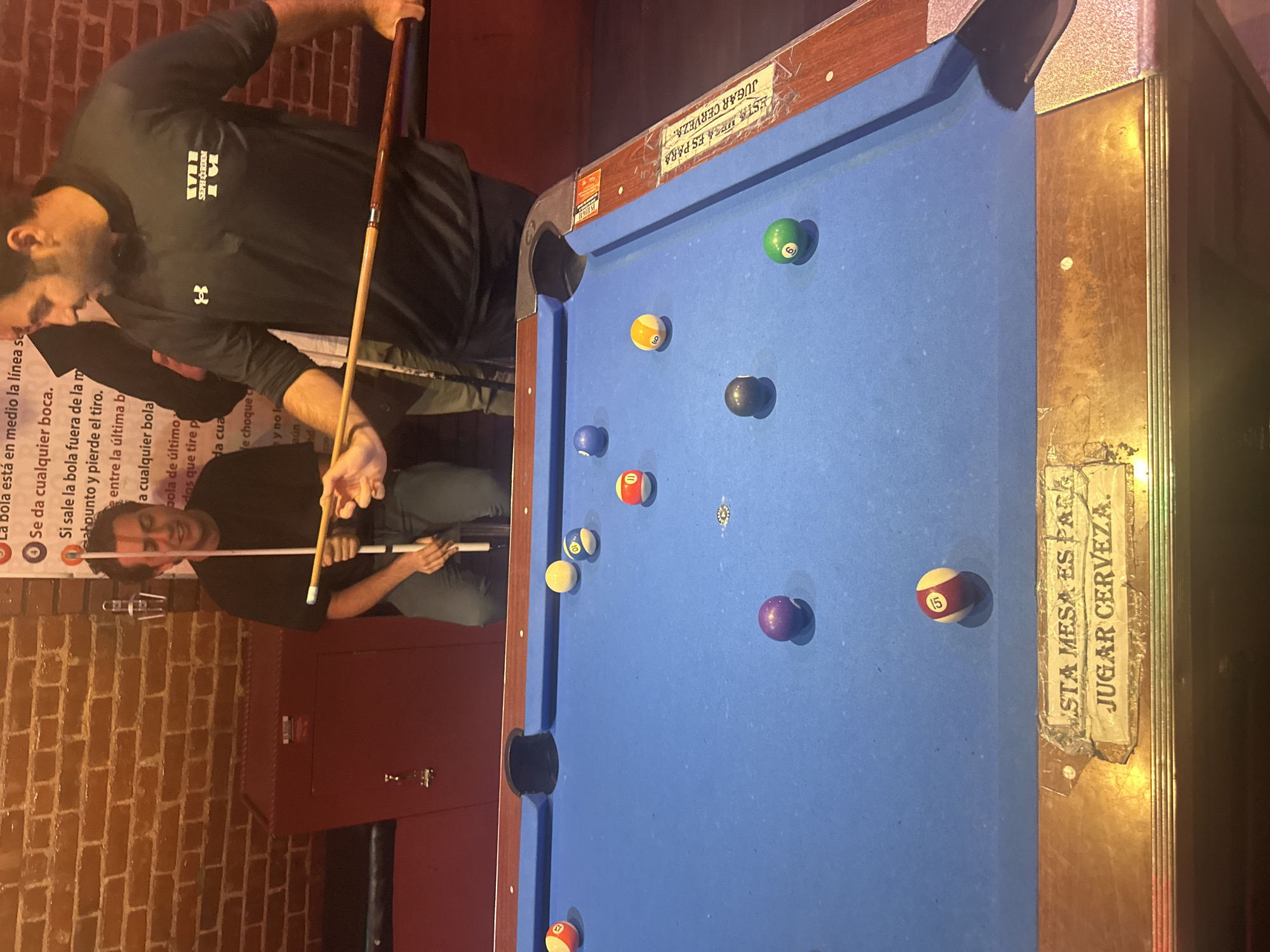 Late-night pool and basketball viewing session in New York