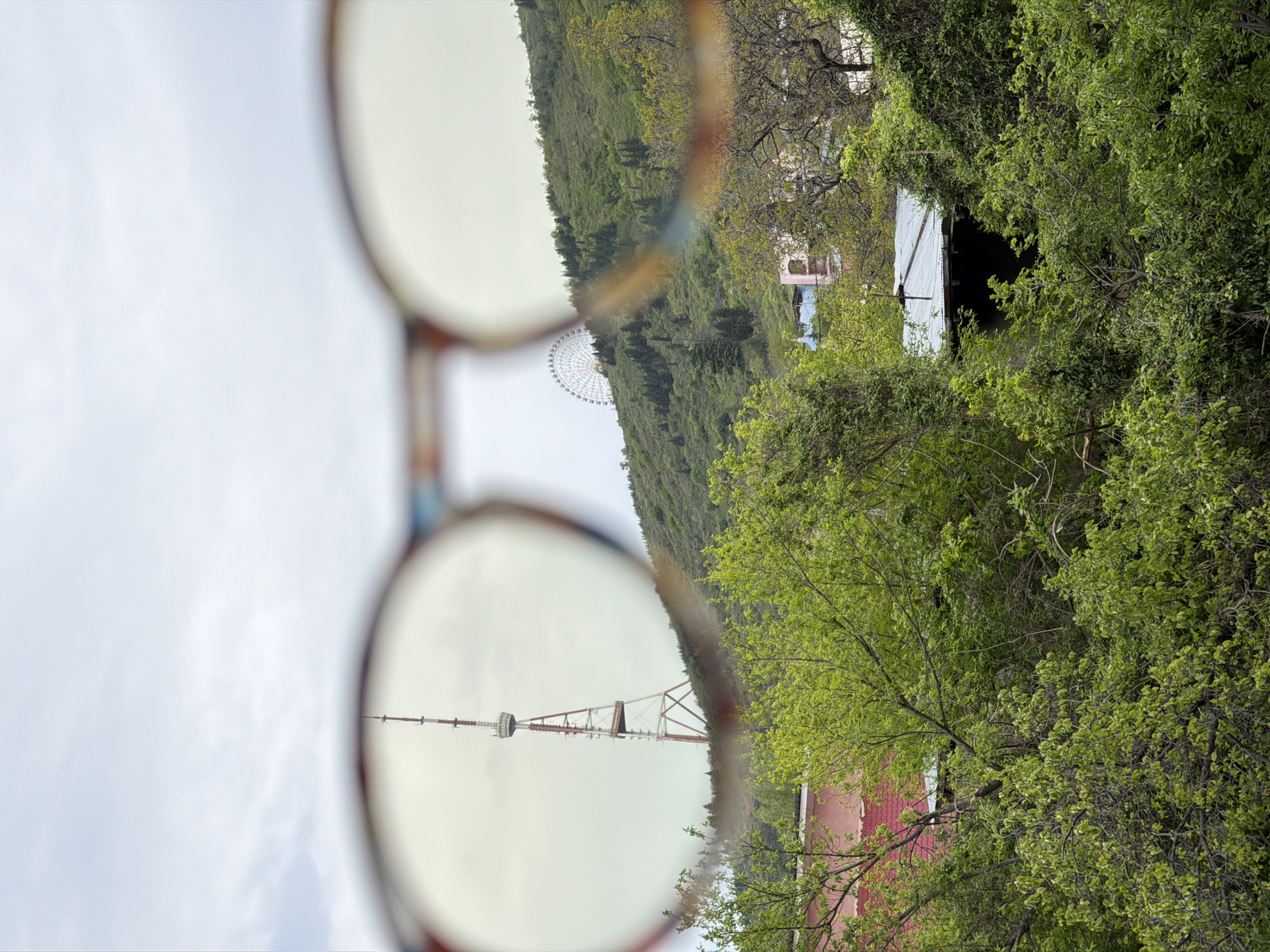 Tbilisi landmarks viewed through eyeglasses in morning POV challenge