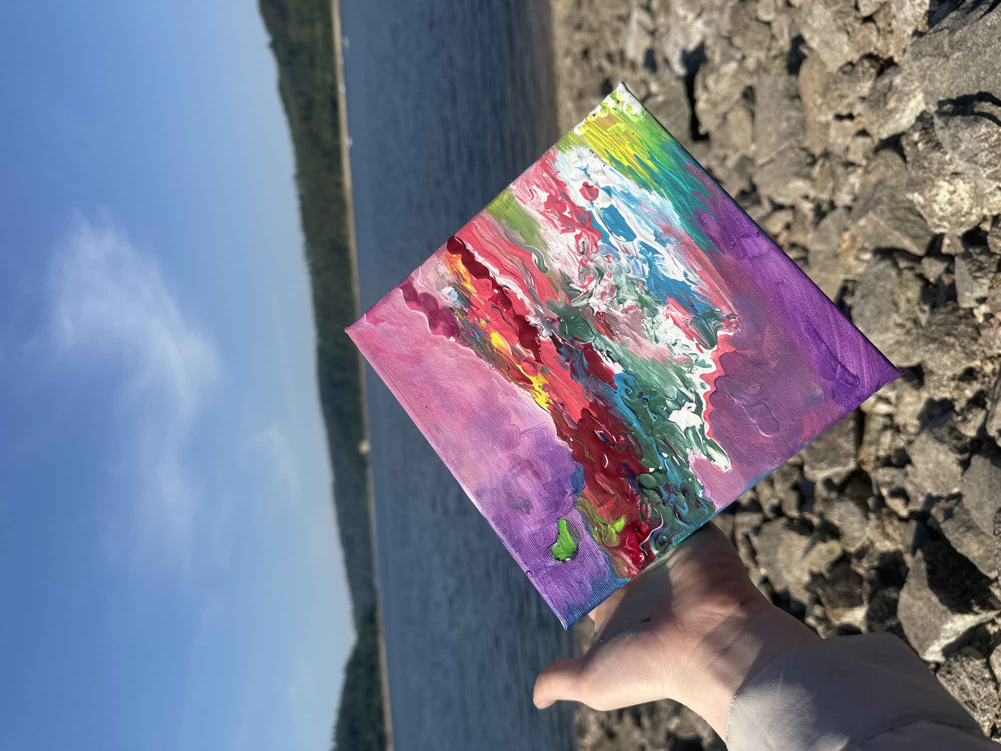 Abstract canvas held up against the Bohostice countryside