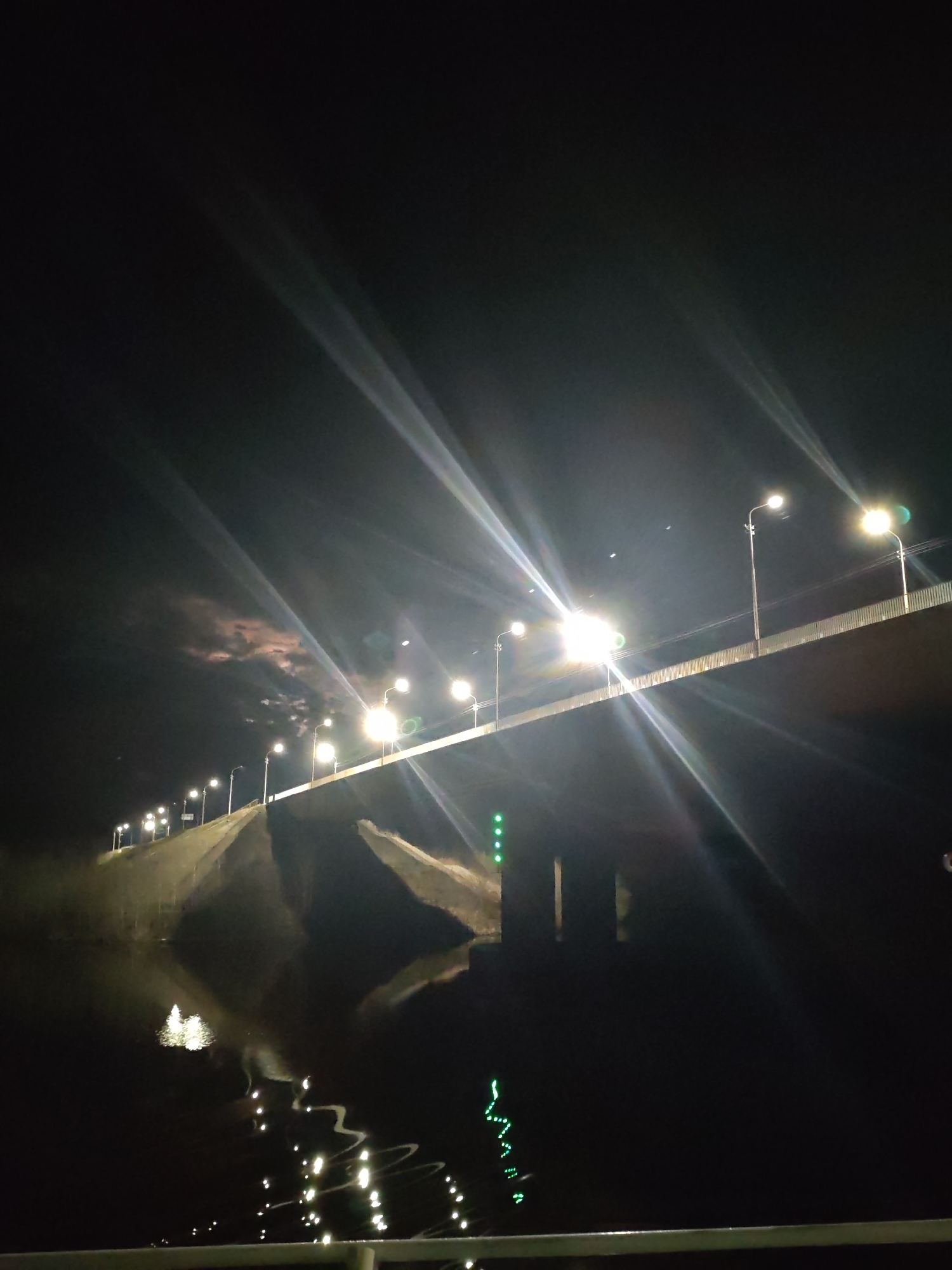 Nighttime bridge illumination captured in Sheksna, Russia