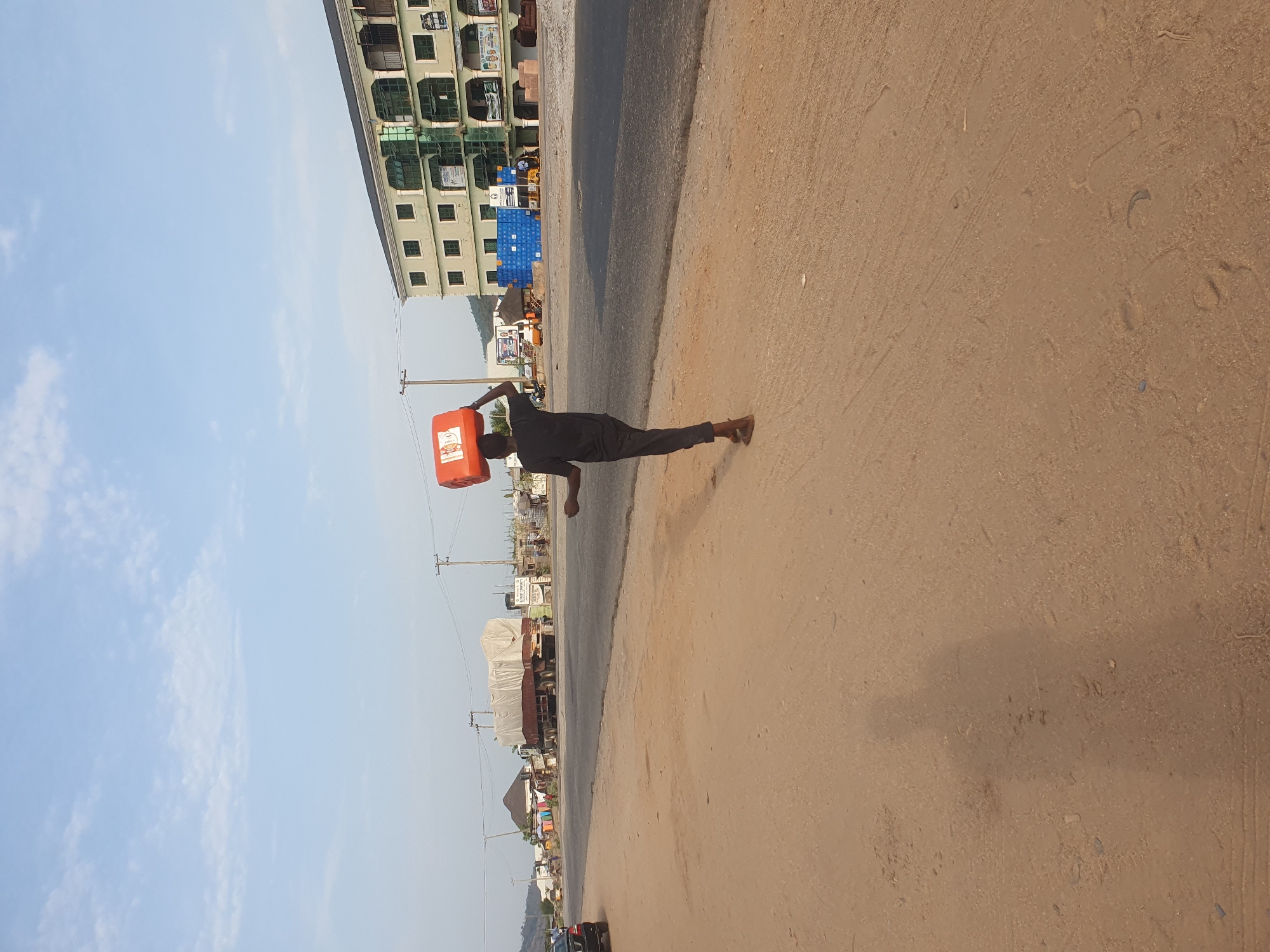 Daily life documented on Lokoja streets during afternoon hours