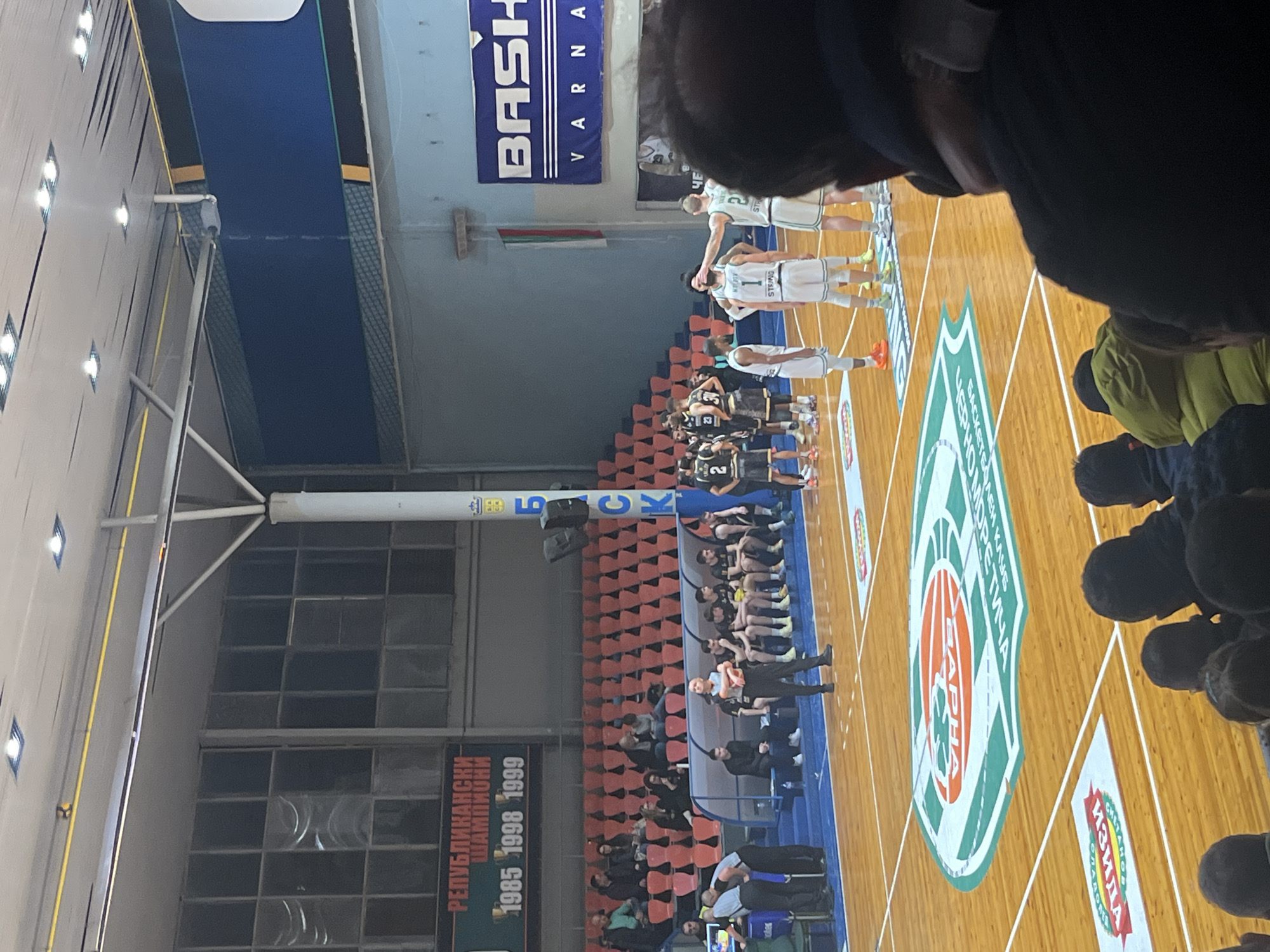 Basketball game underway in Varna gymnasium between two teams