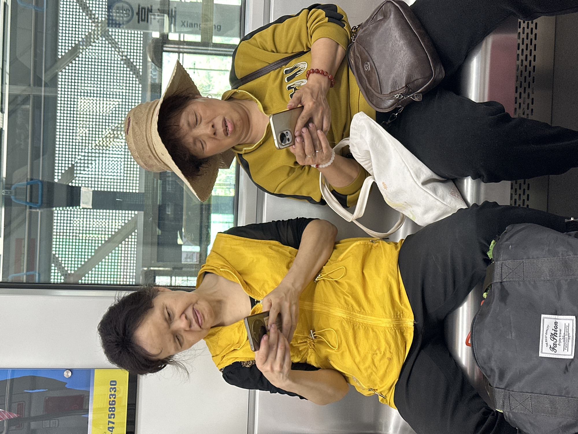 Early morning commuters ride public transit in Shuangfu
