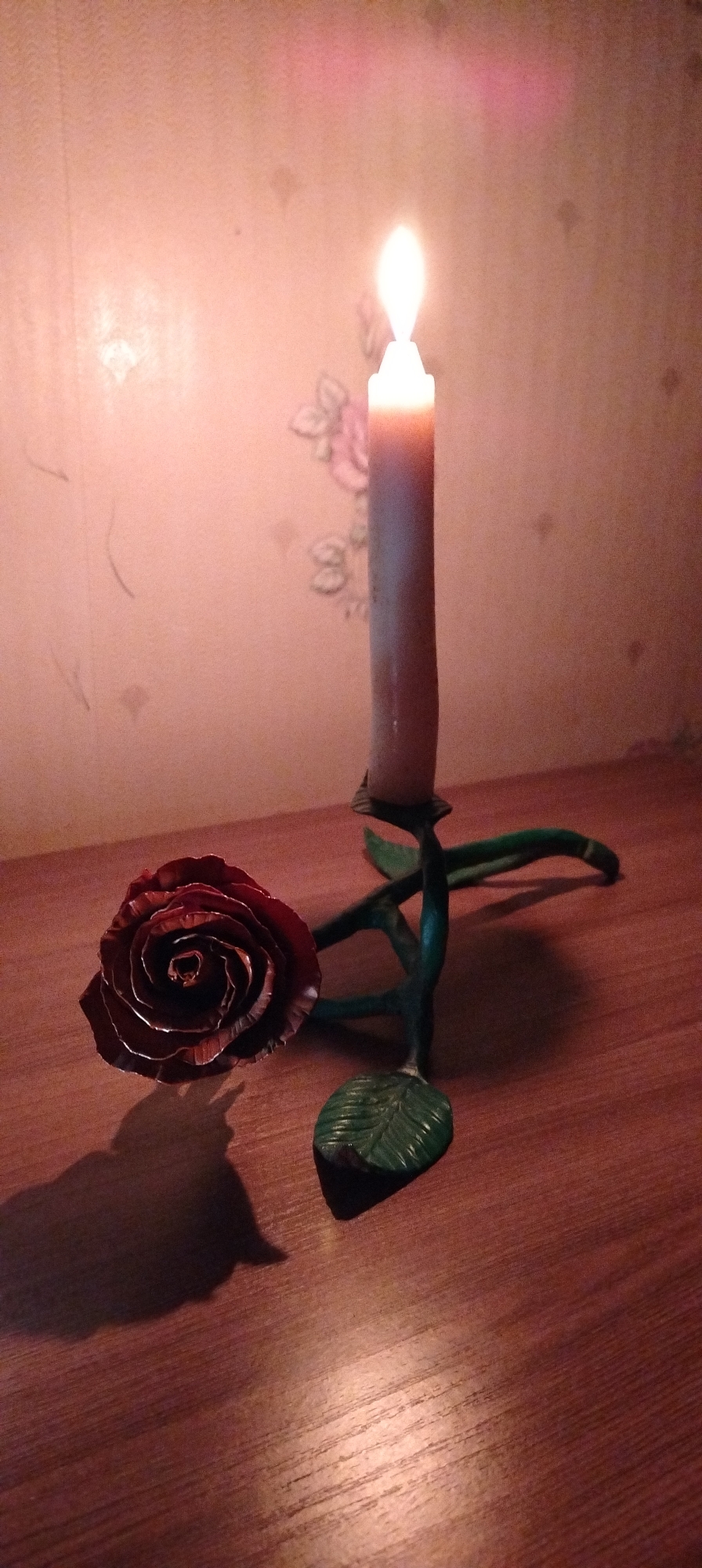 Quiet evening moments with candles, flowers, cat in Russian home