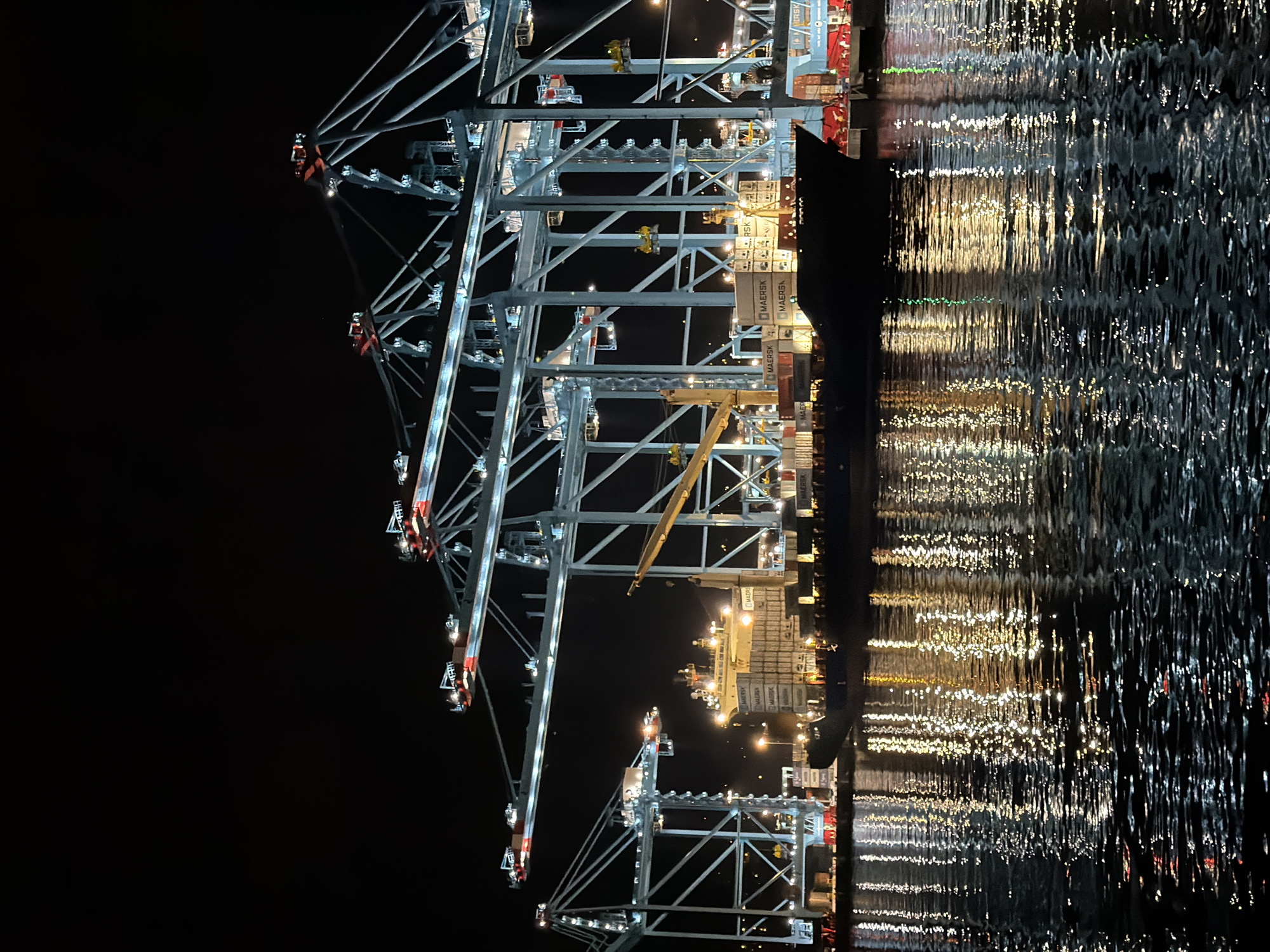 Illuminated cargo cranes observed at Rijeka port during nighttime