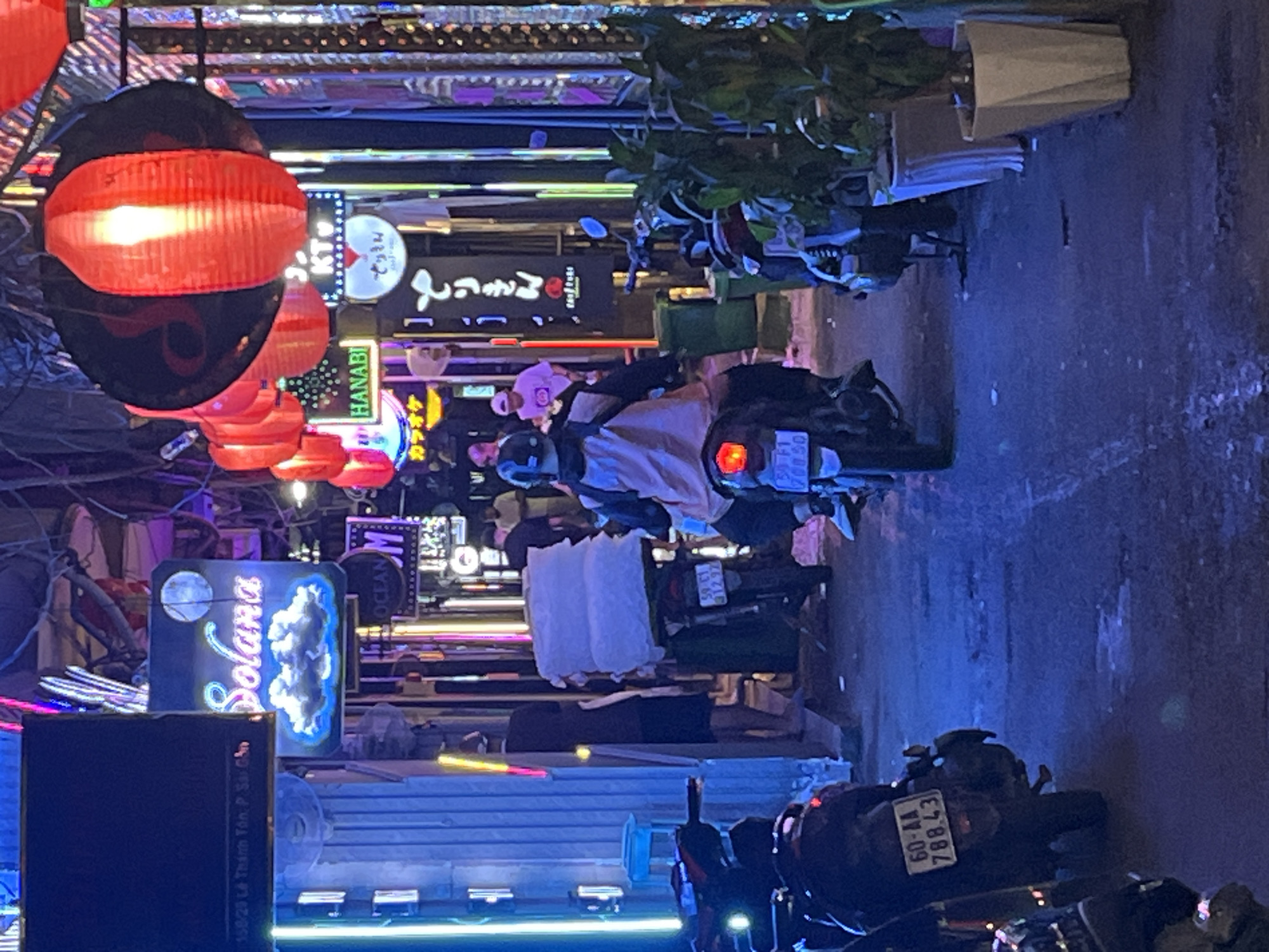 Evening street tour through Thủ Đức's neon-lit commercial district