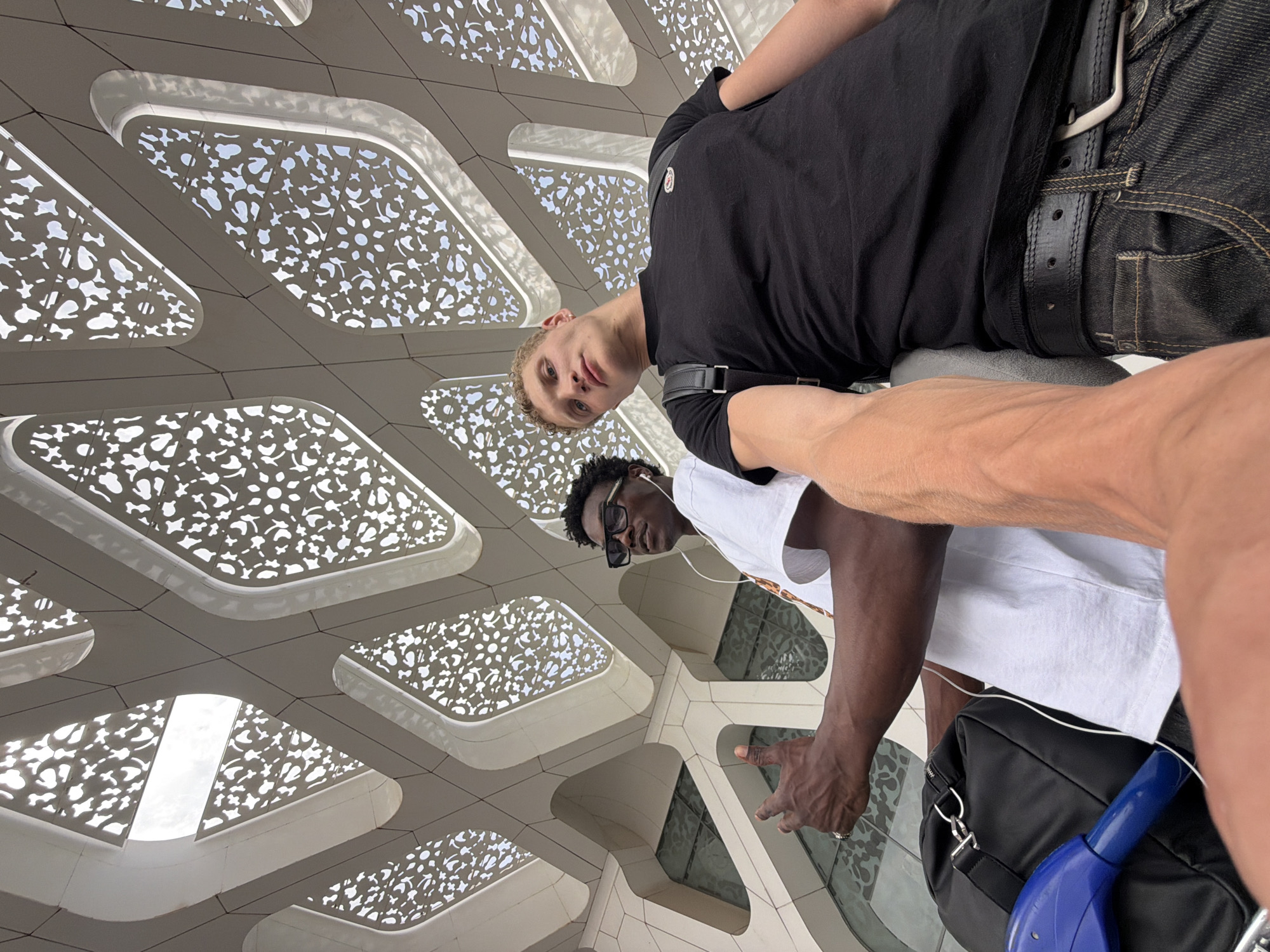 Multi-passport group moves through Marrakesh Menara Airport departure process