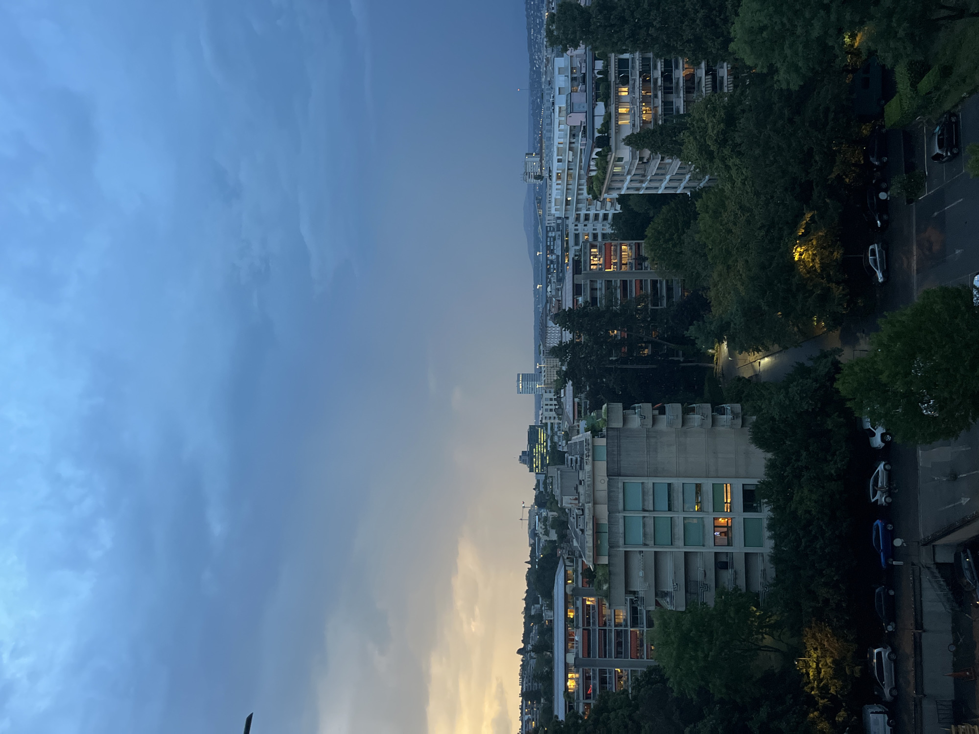 Geneva skyline tracked through a summer storm, dusk to night