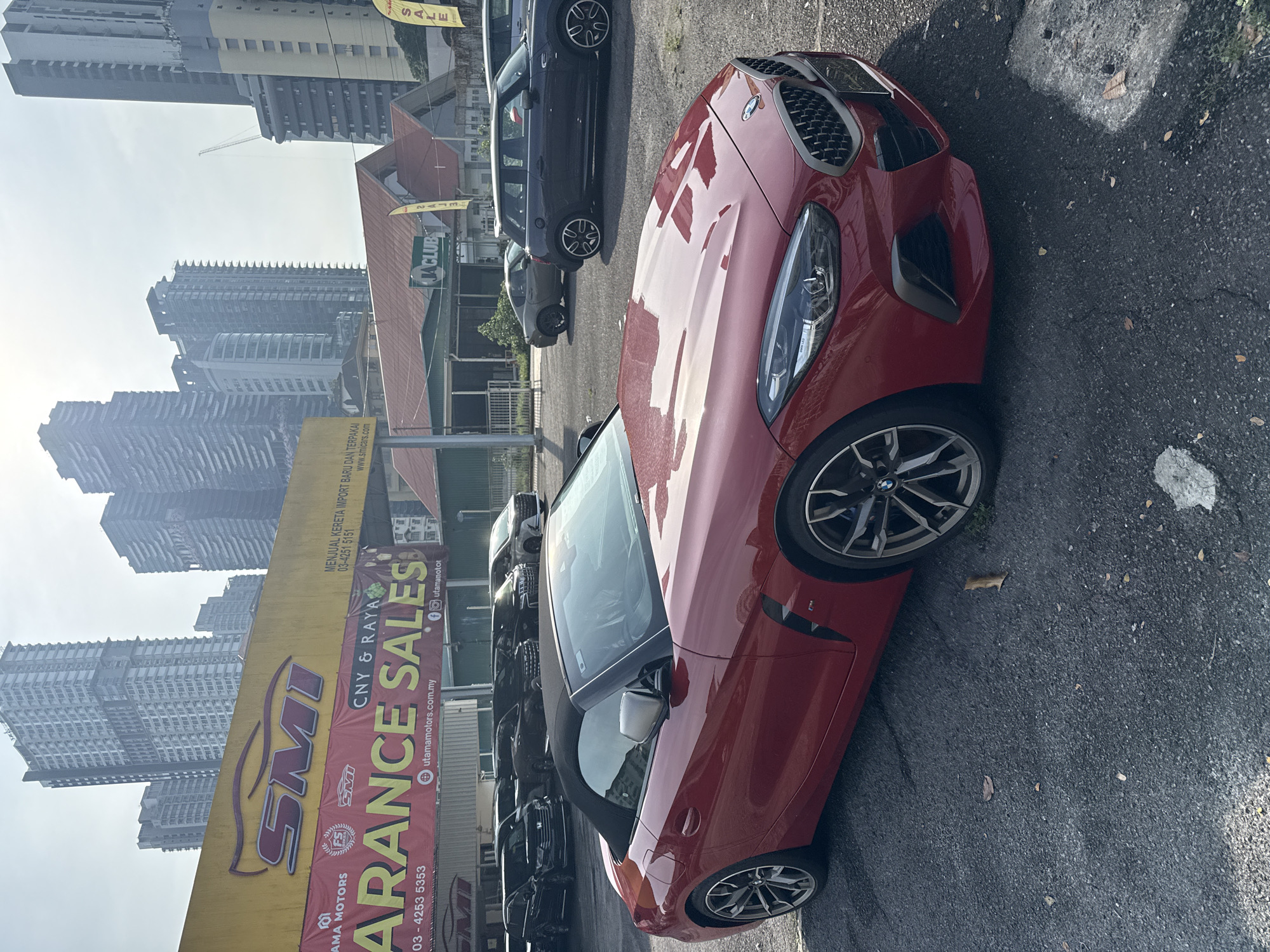 Sports cars spotted at Kuala Lumpur dealership during promotional sale