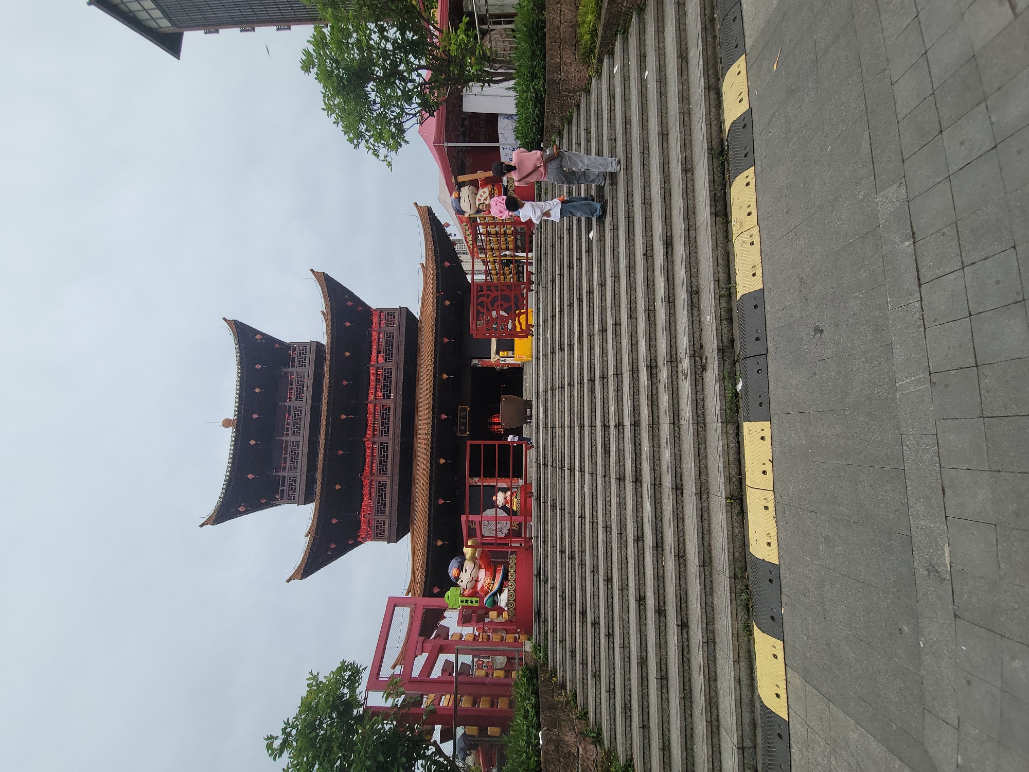 Tourist documents traditional architecture and street life in Shapingba District