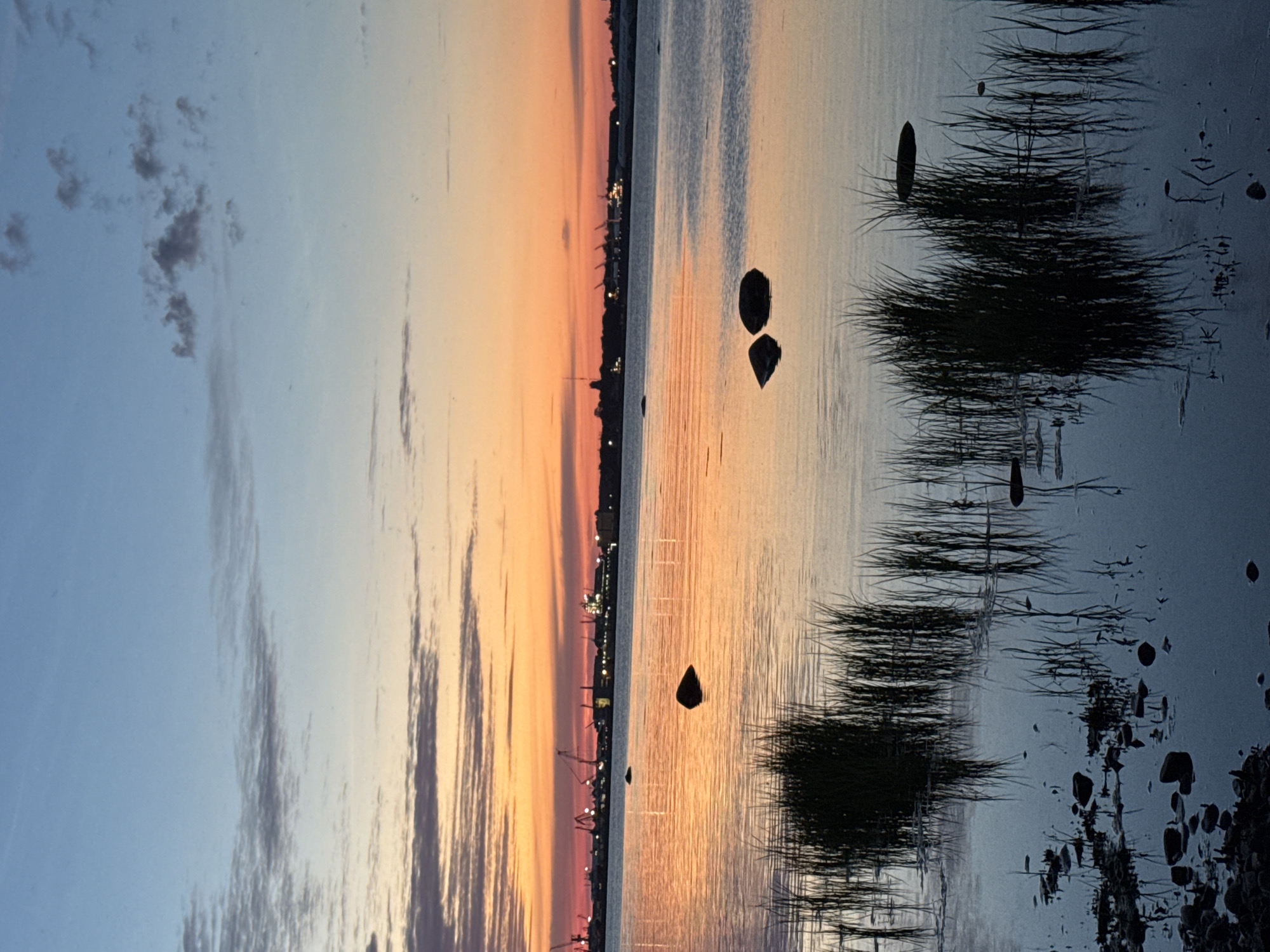 Tallinn waterfront glows during a quiet summer sunset