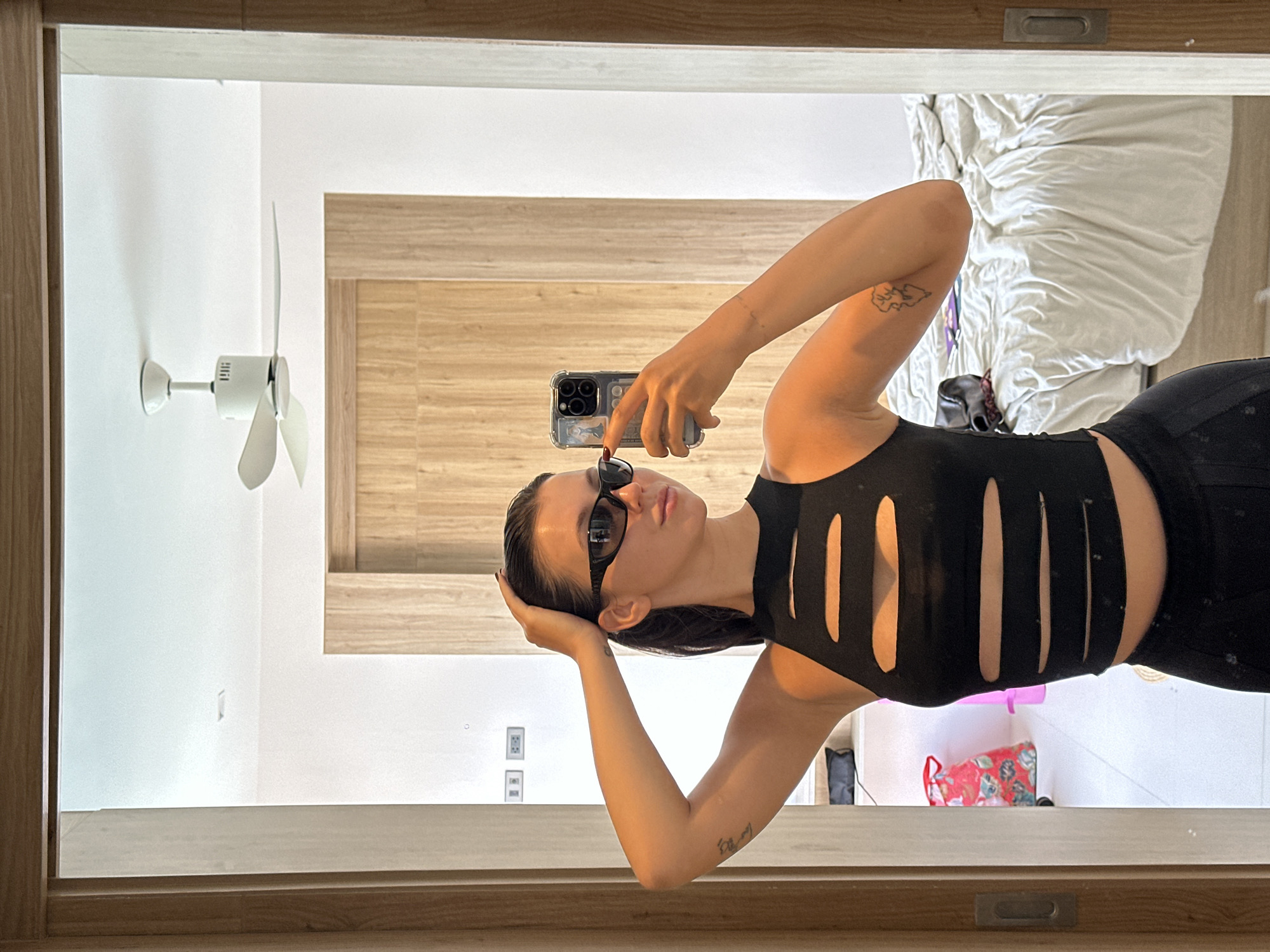 Hotel mirror selfie in Choeng Thale, full black outfit
