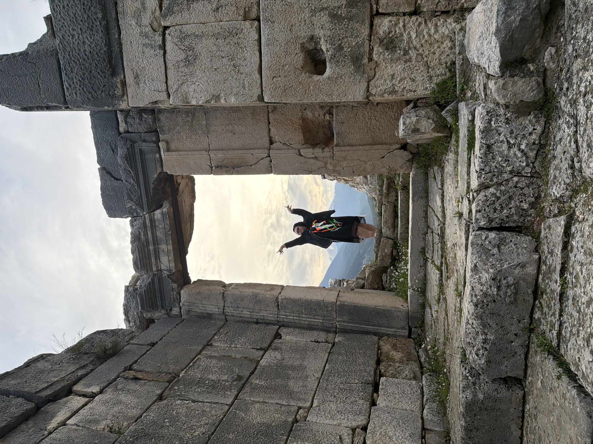 Tourist documents visit to ancient ruins in Finike, Turkey