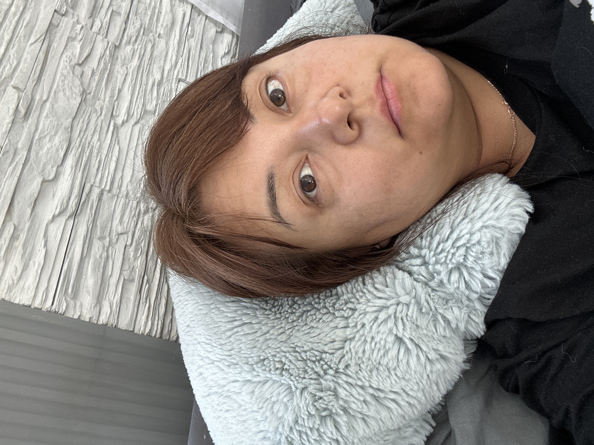 Woman resting in bedroom during early morning hours