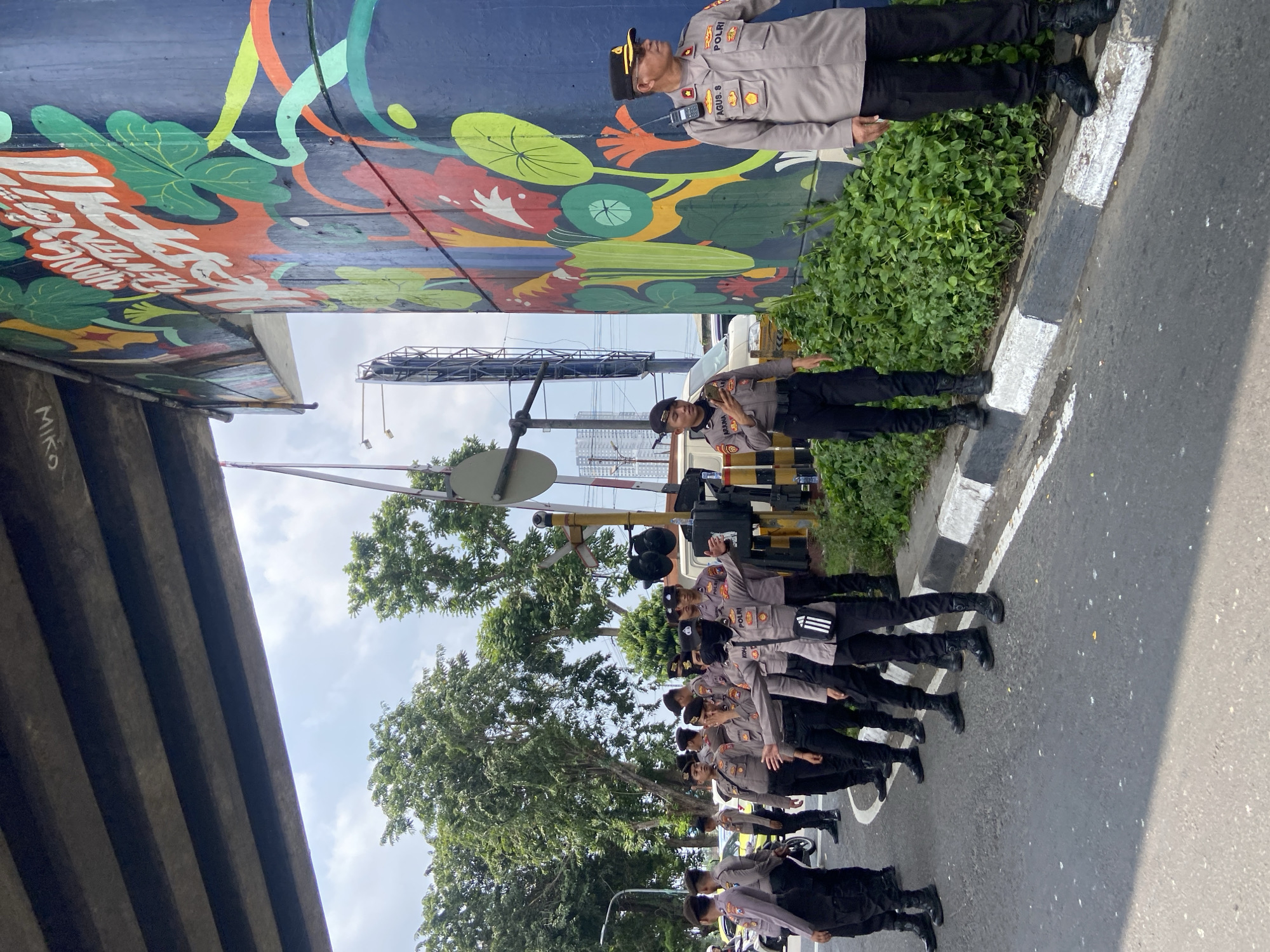 Police officers gather for formal ceremony in Surabaya