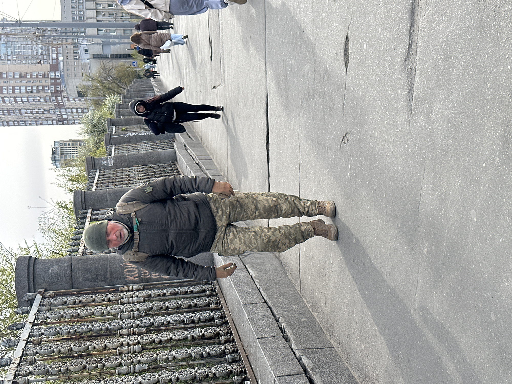 Morning street life documented across Kyiv during overcast day