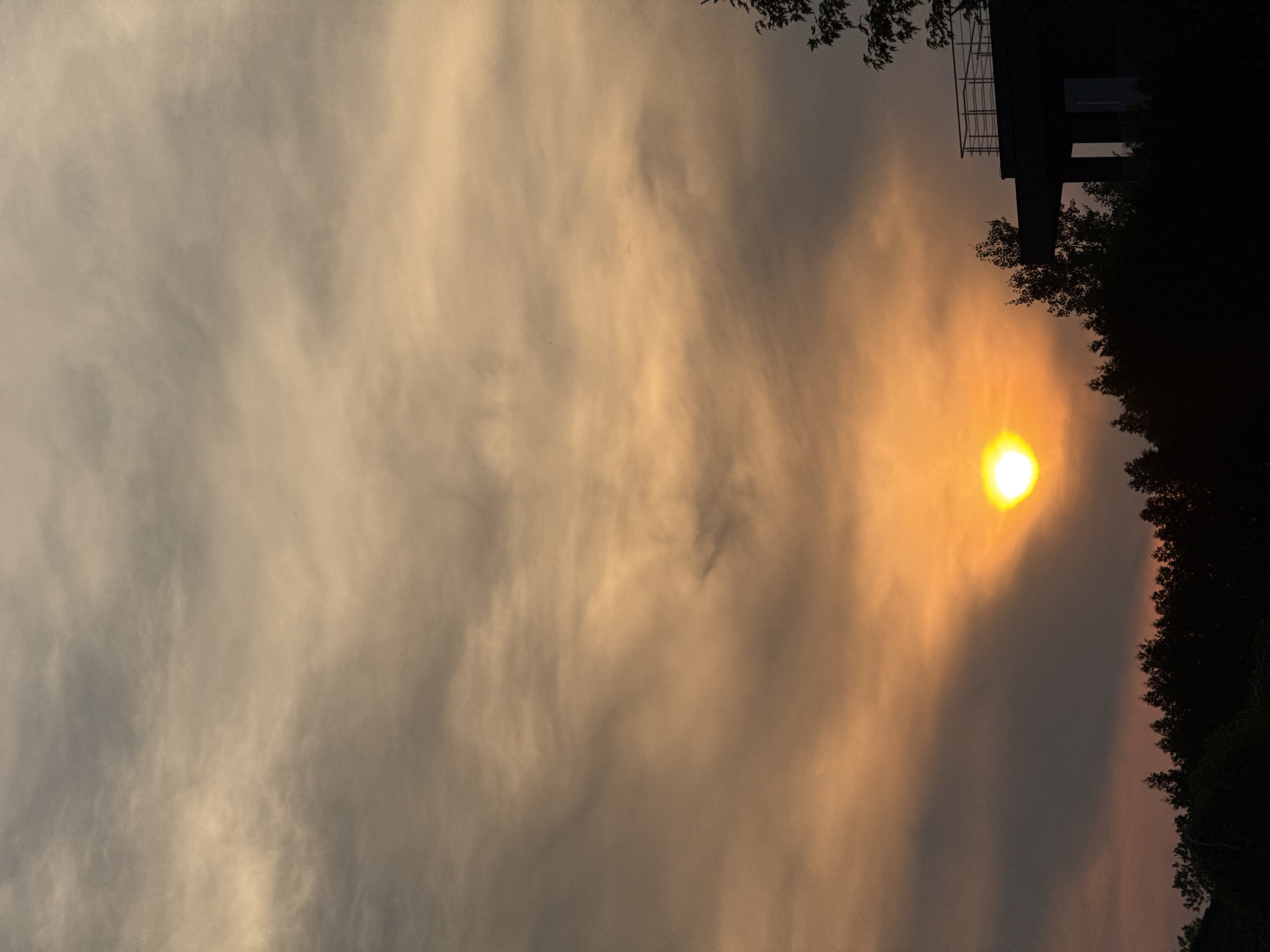 Sunset captured at Troitskoye marina with boats and aircraft