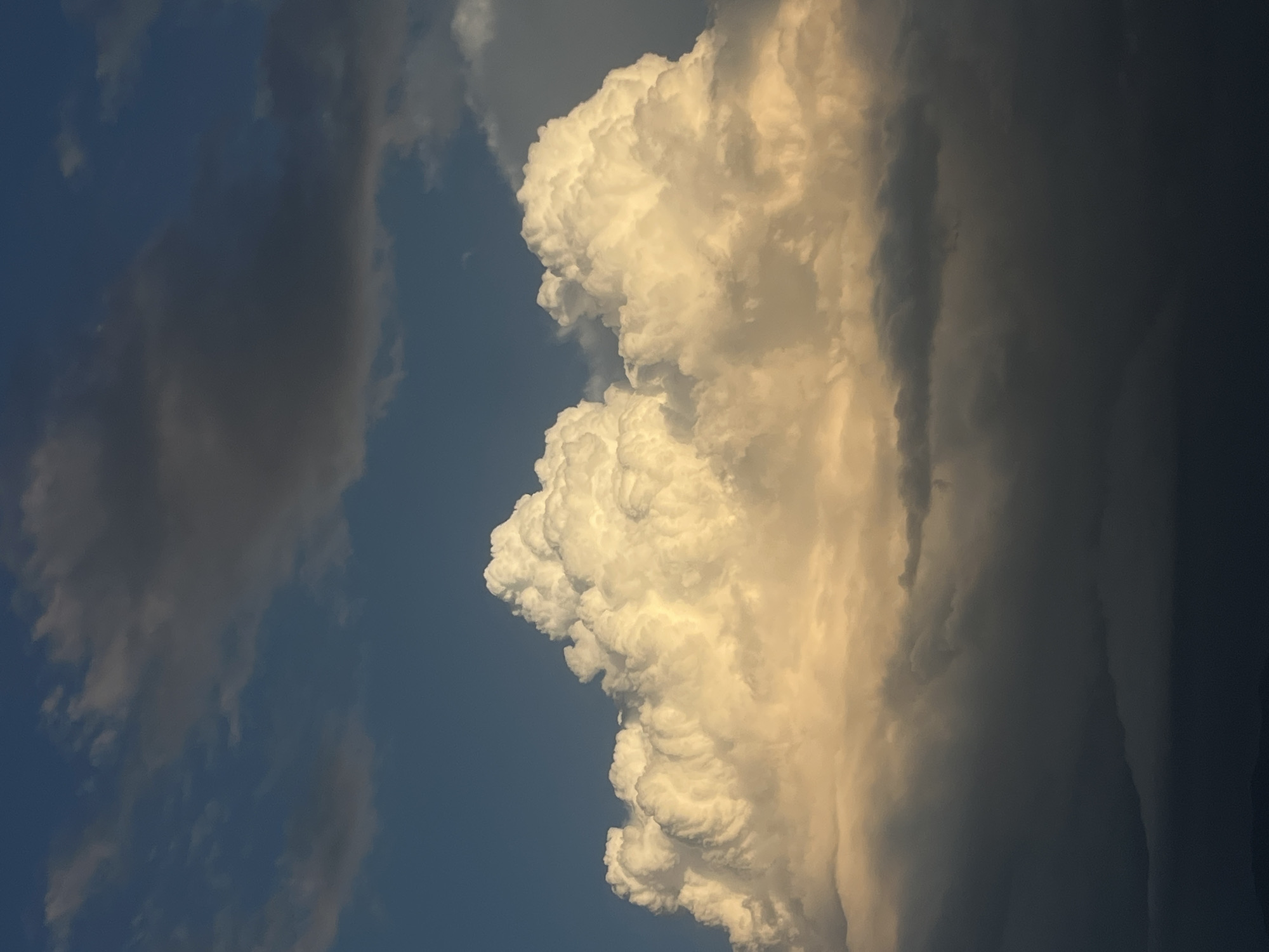 Dramatic cumulus clouds at golden hour over Gabrovo, Bulgaria.
