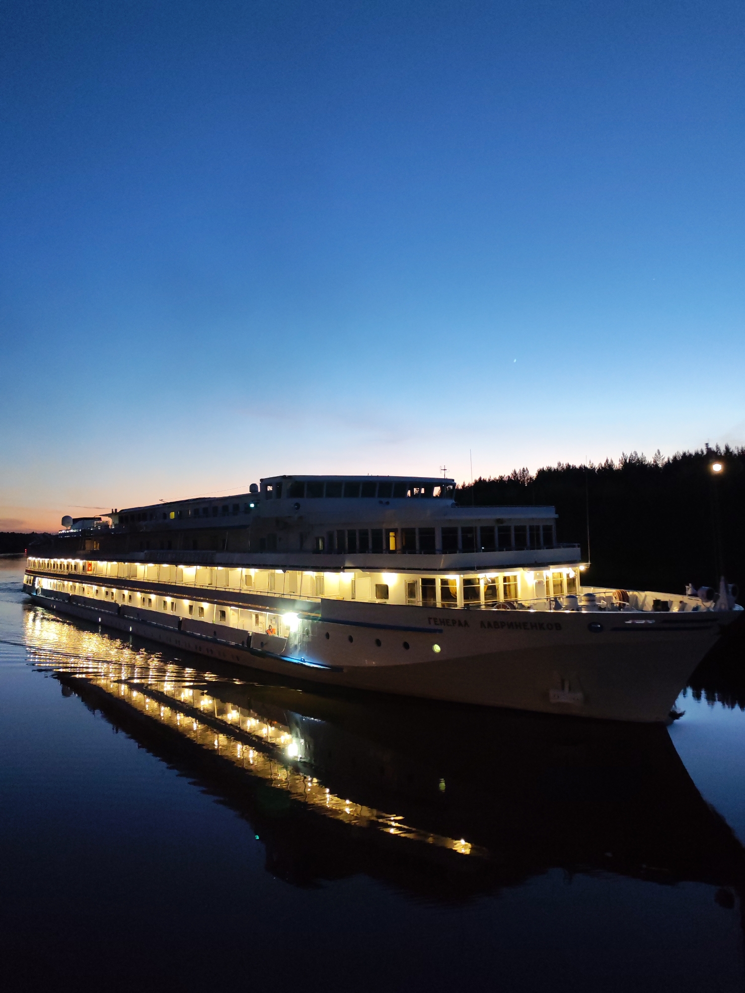 River cruise ships transit canal locks in Devyatiny, Russia