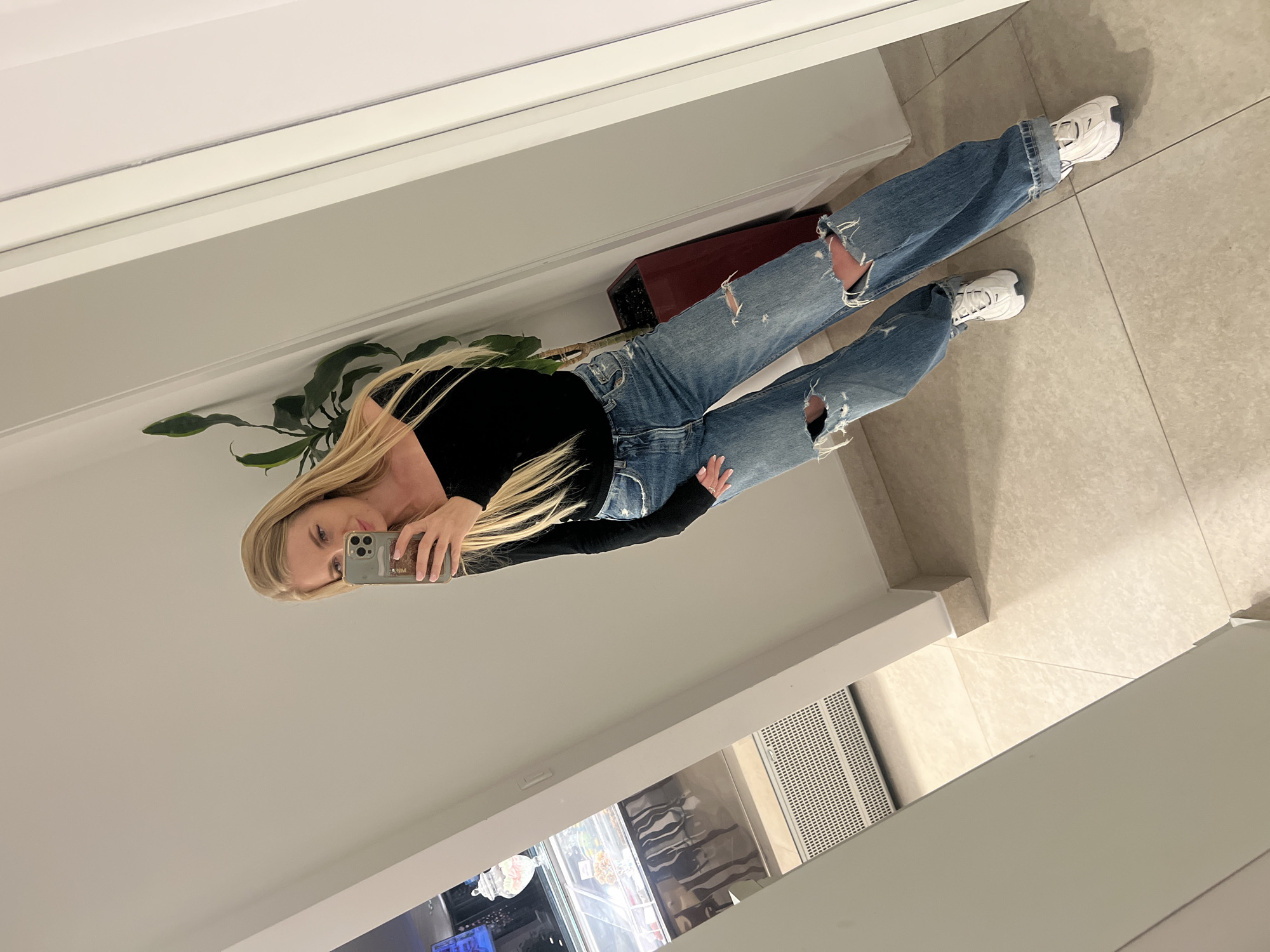 Woman takes mirror selfie in Boreti, Montenegro