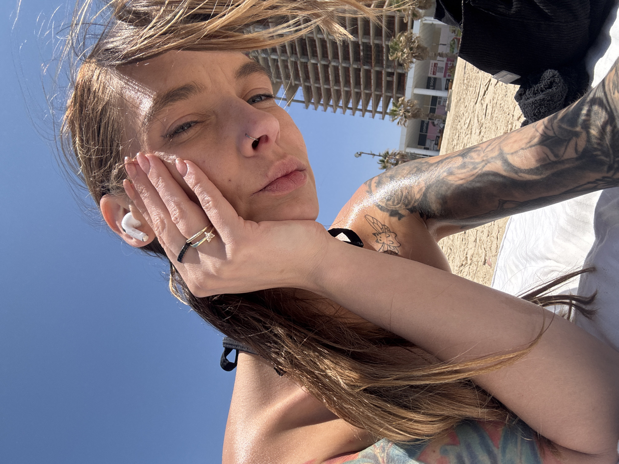 Woman documented at Bat Yam beach with sand footprints