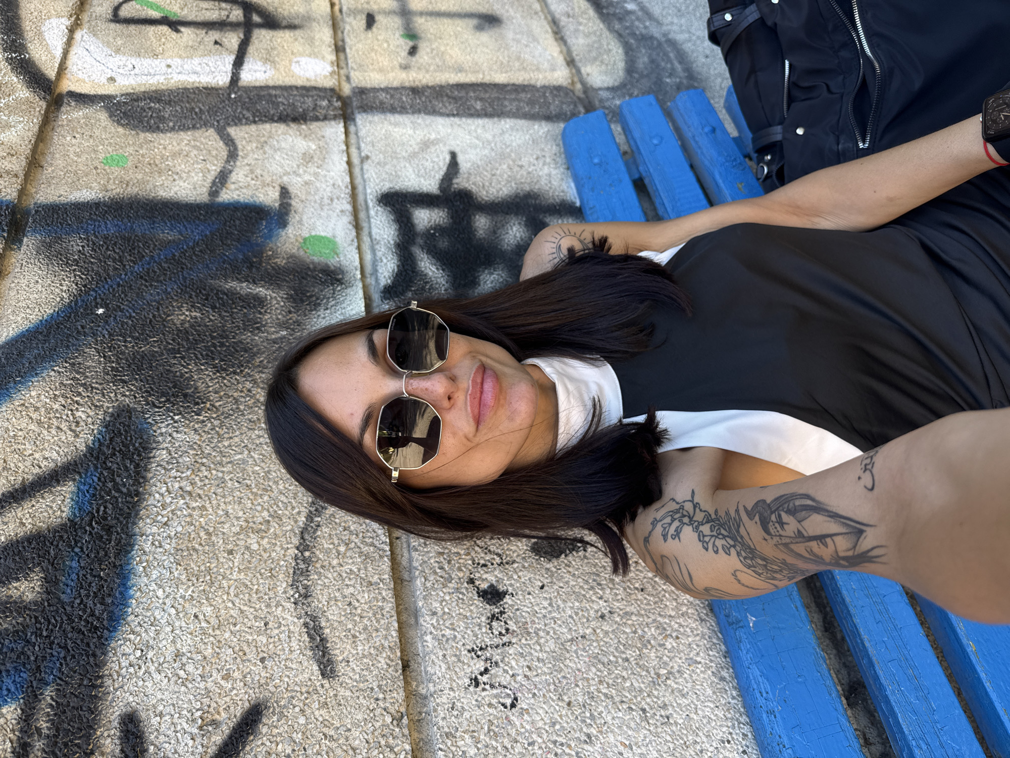 Woman photographed in various poses around Pleven park area