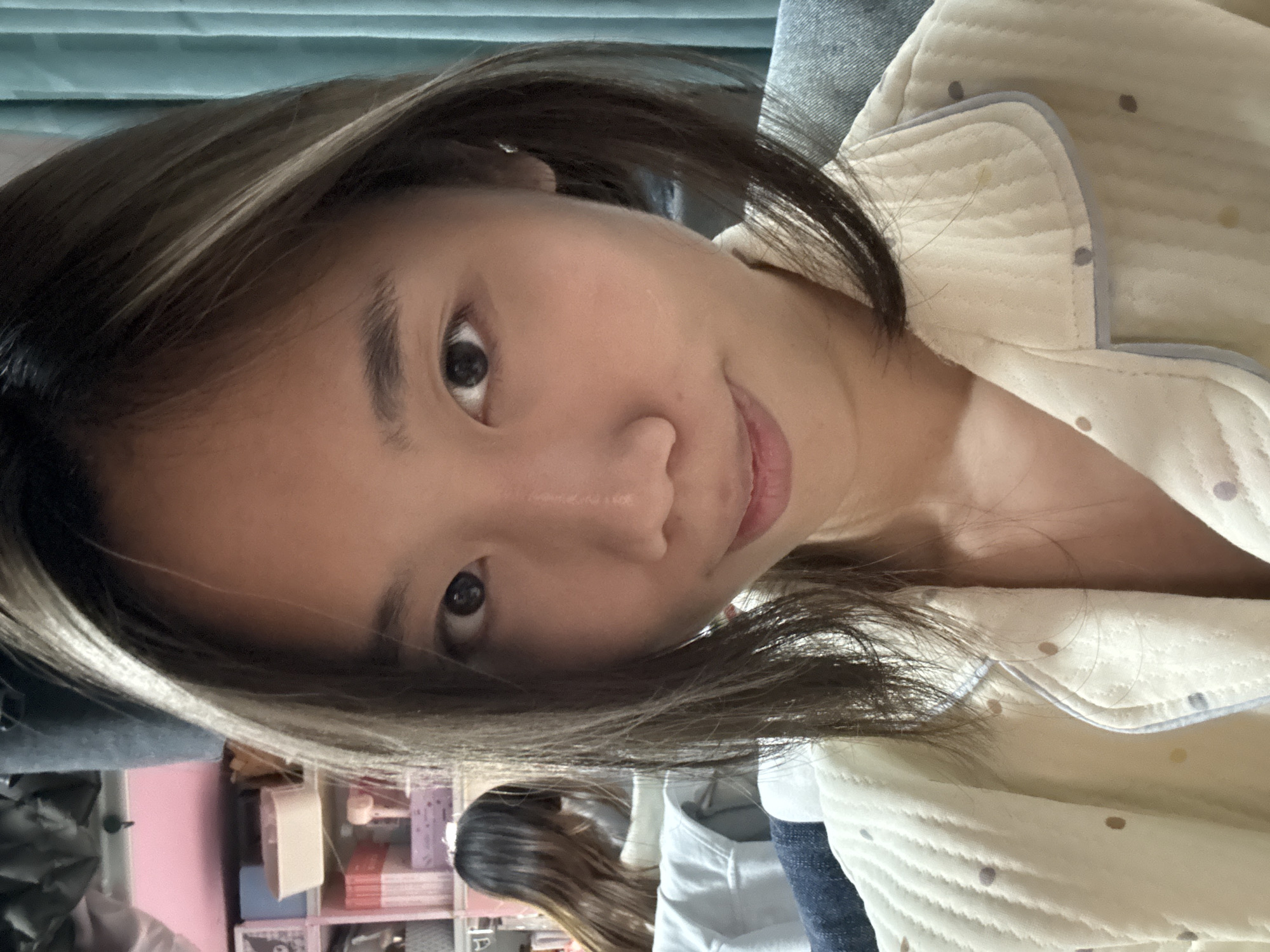 Woman takes multiple selfies in pajamas in Chongqing