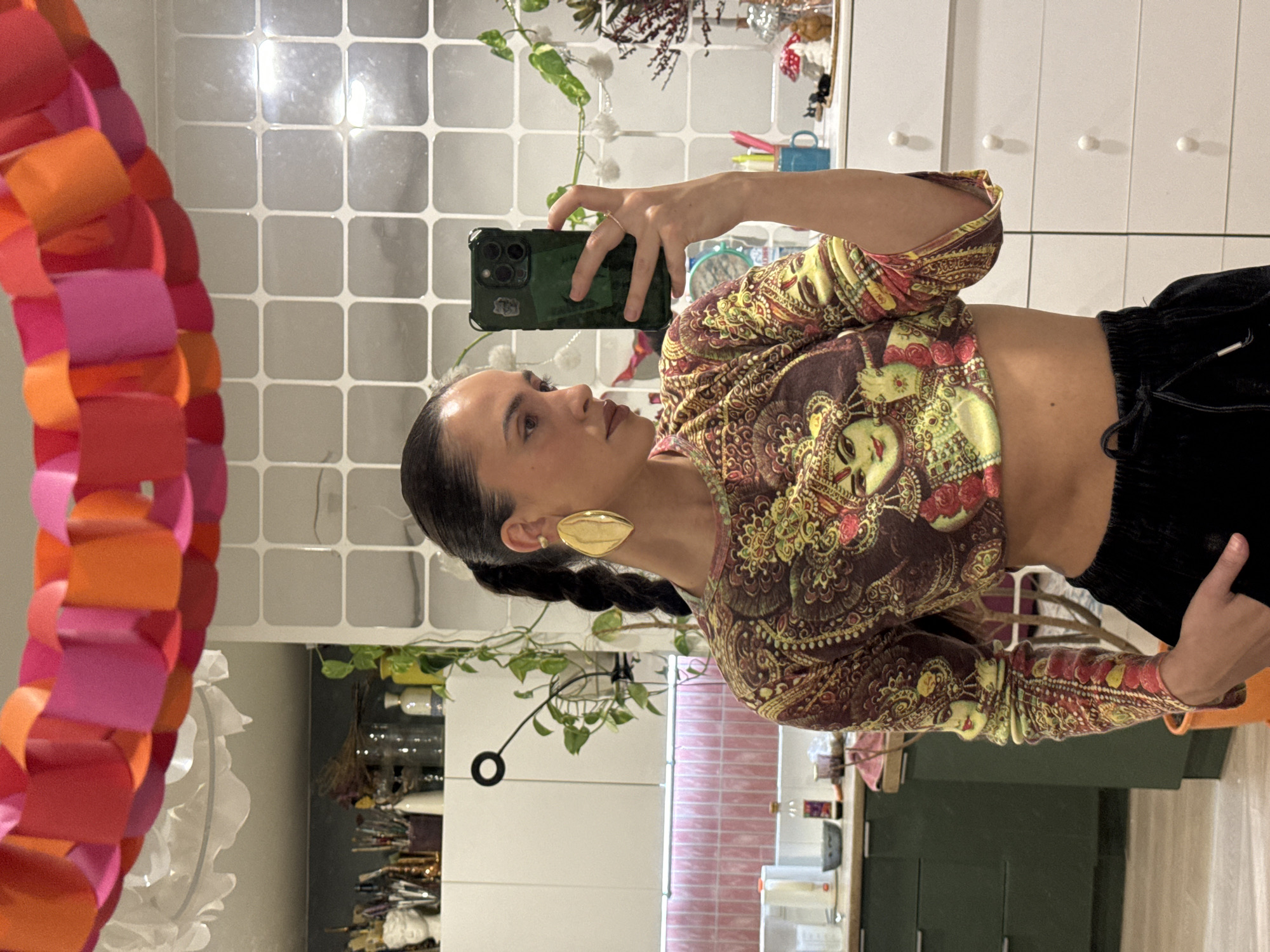 Woman takes selfies in decorated mirror in Krasnoyarsk