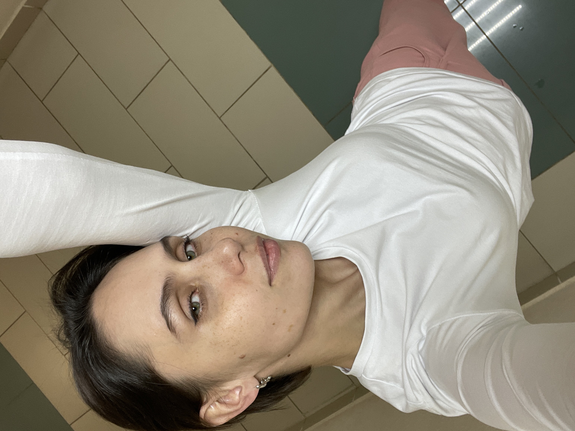 Woman photographed in two indoor locations in Izhevsk
