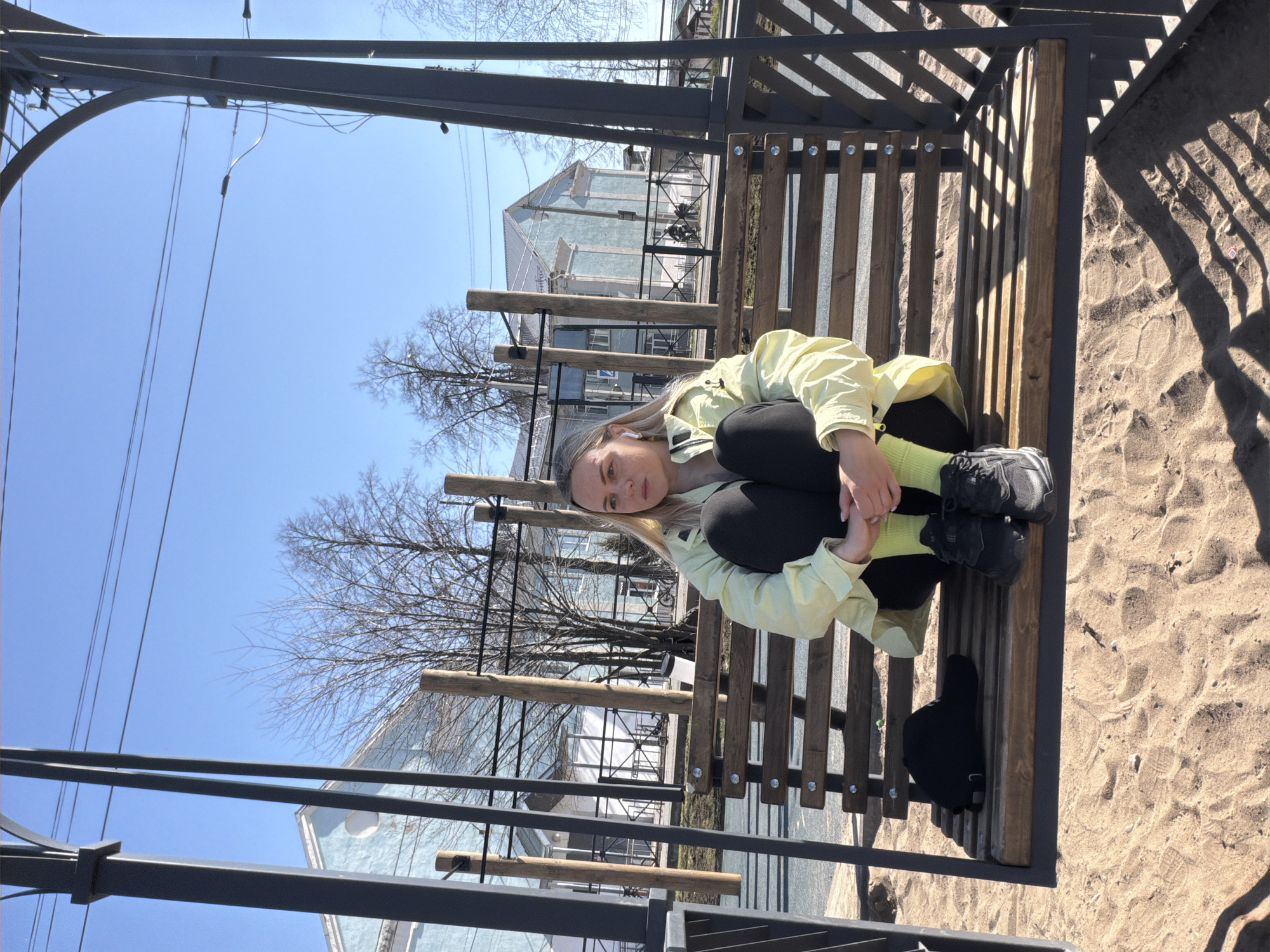 Woman with stroller enjoys lakeside break in Votkinsk