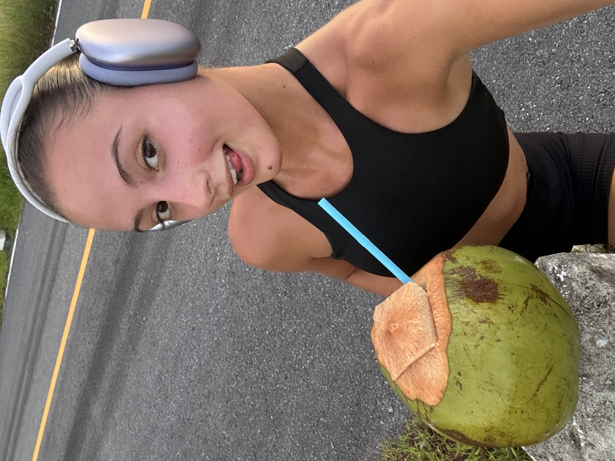 Woman Takes Athletic Selfies on Chalong Road