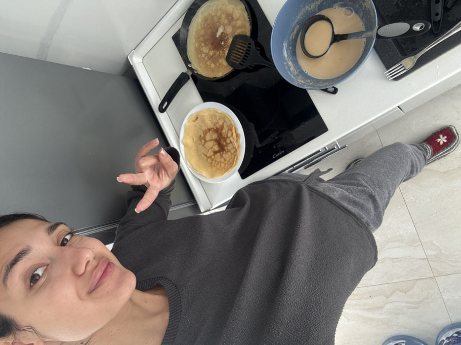 Woman films cooking content in Budva, Montenegro