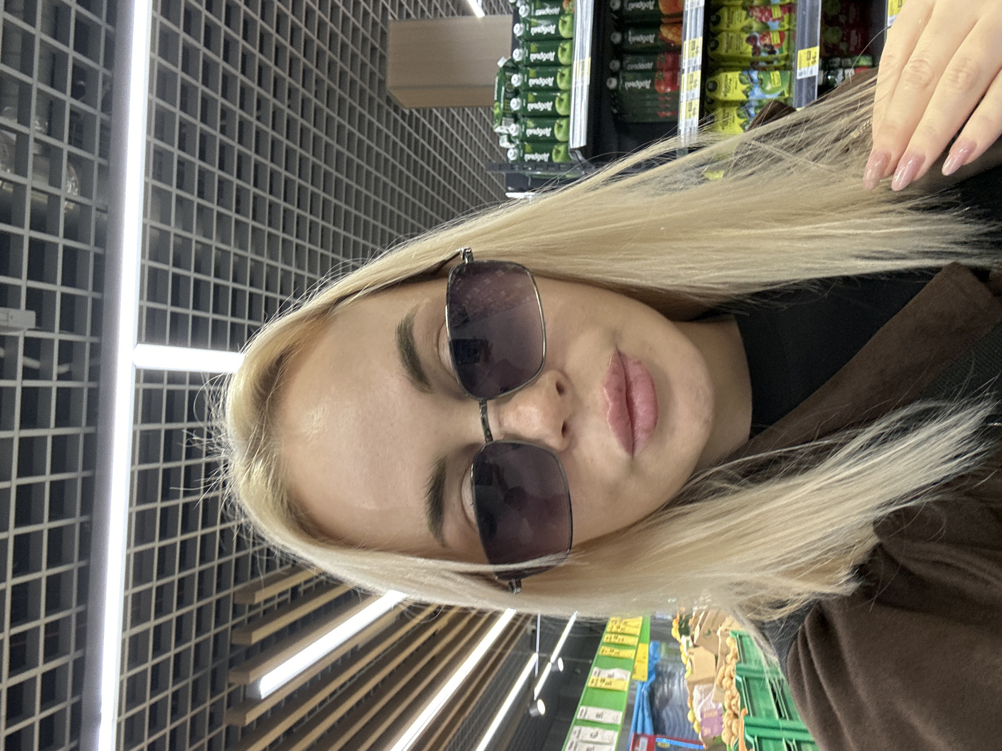 Woman shops at retail store in Megion, Russia
