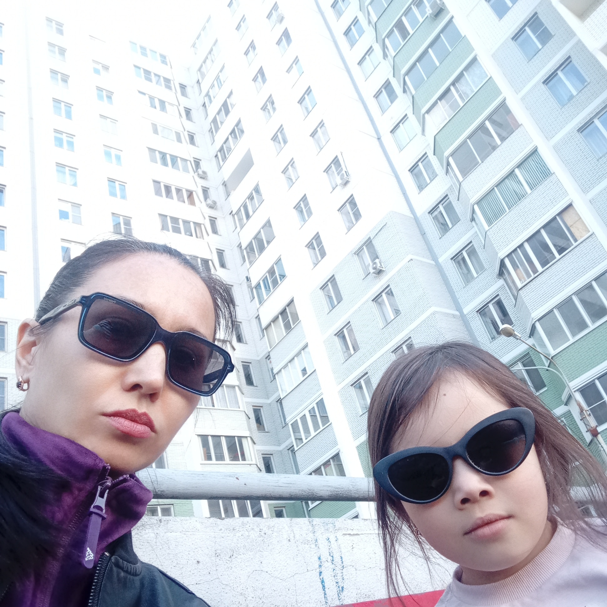 Mother-daughter outing captured across Russian cities on spring afternoon