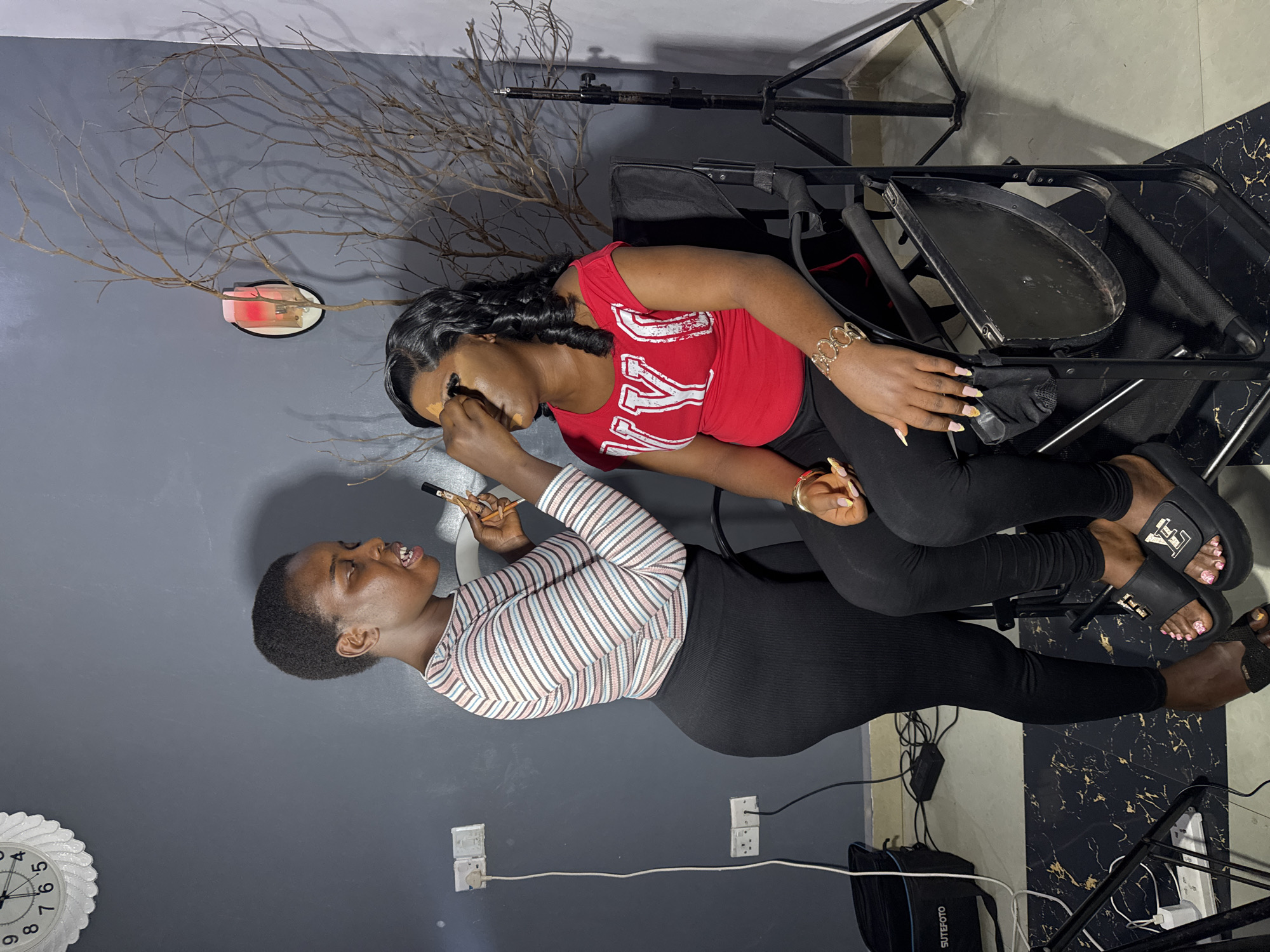 Studio makeup session underway in Gura Top, Nigeria