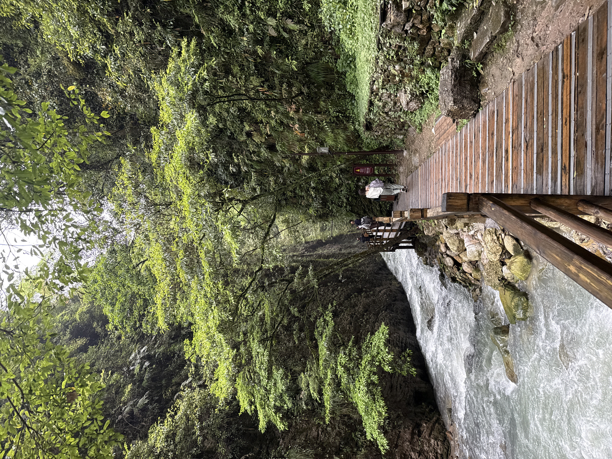 Waterfall over concrete structure documented in Zhangjiajie, China