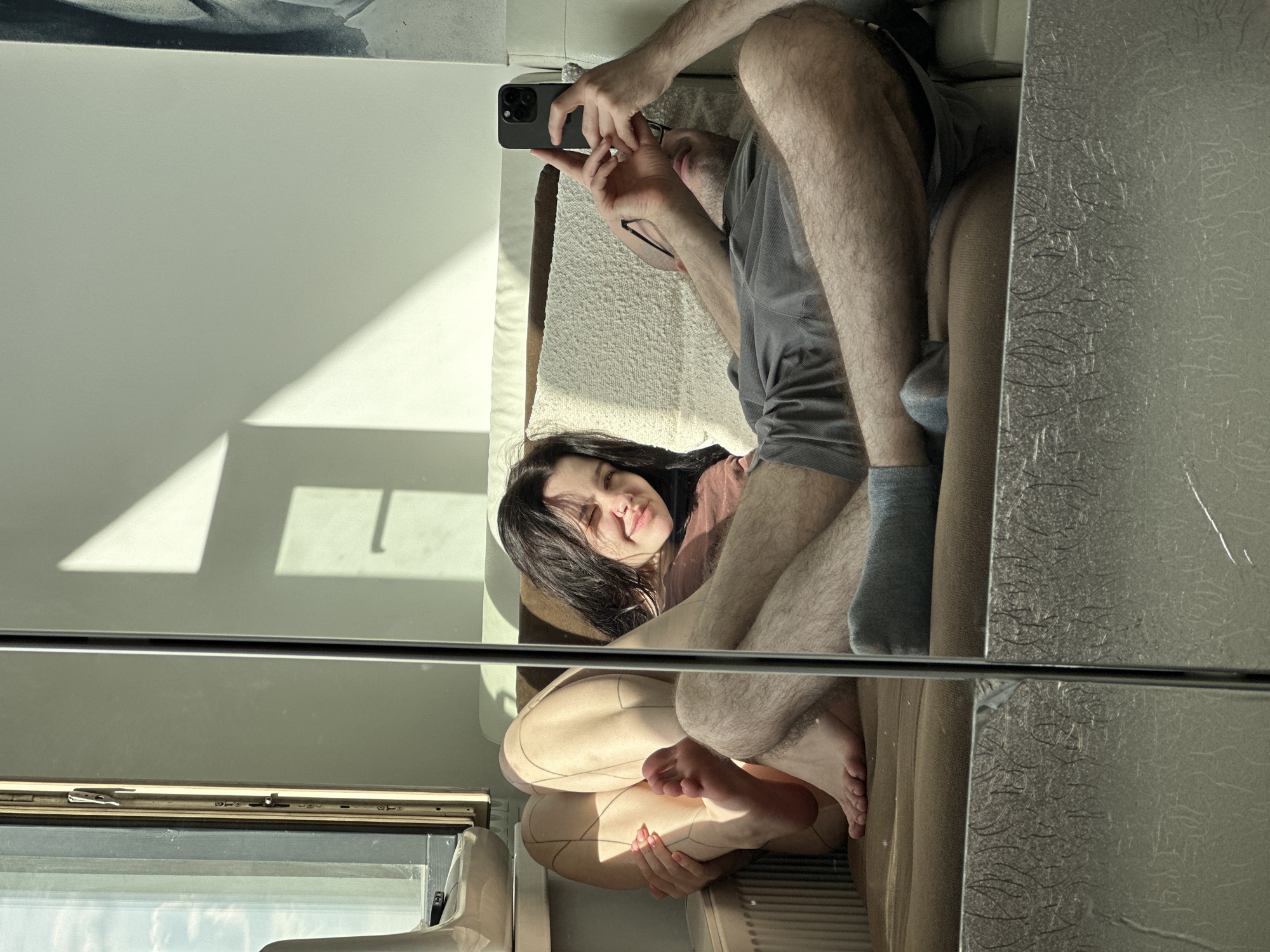 Couple takes mirror selfies in Khimki apartment