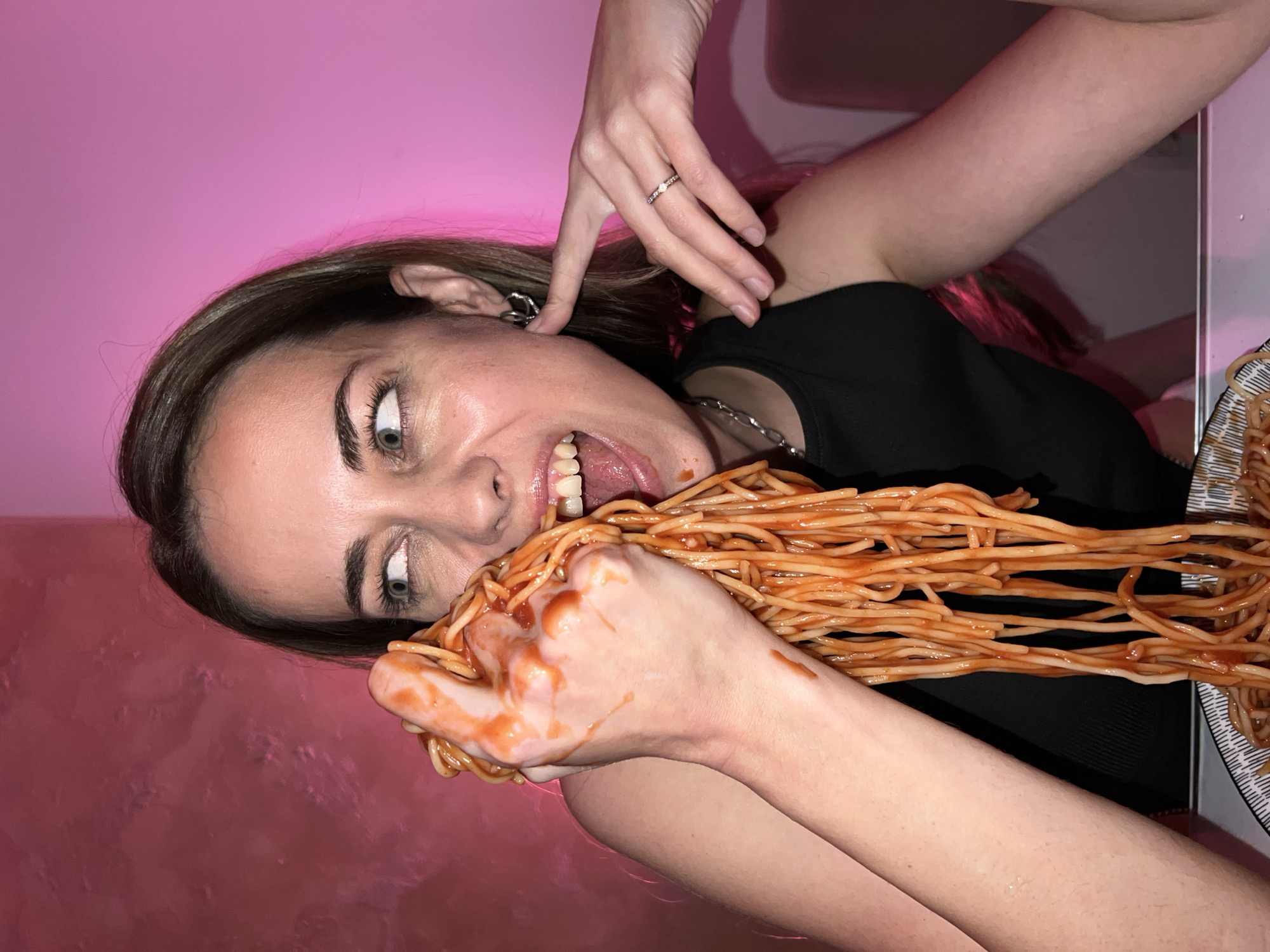 Woman dines on spaghetti at Montenegro bar
