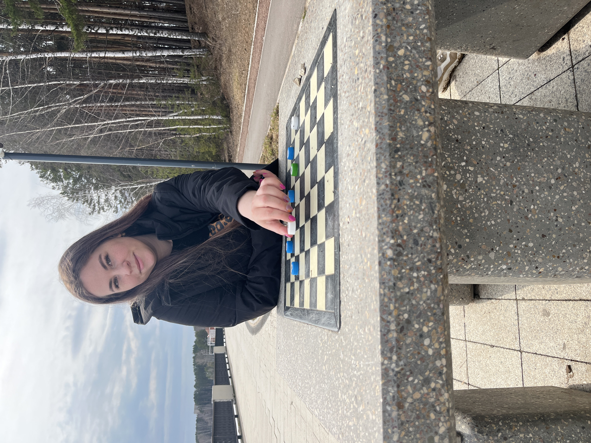 Woman enjoys morning activities at Chaikovsky park