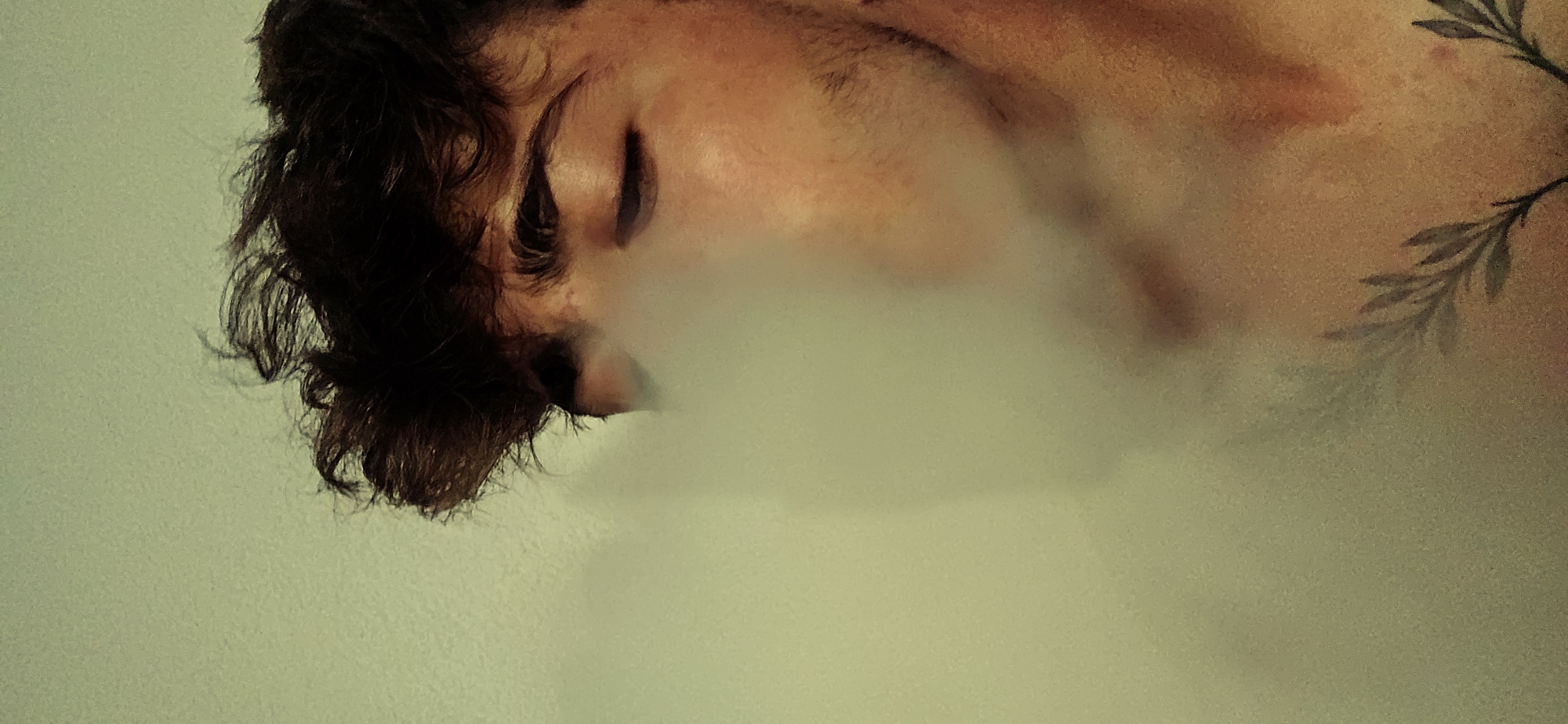 Face tilted upward through drifting smoke, Kitzscher