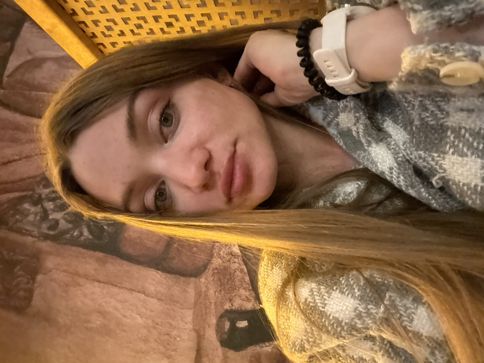 Woman photographs herself indoors in Kazan, Russia