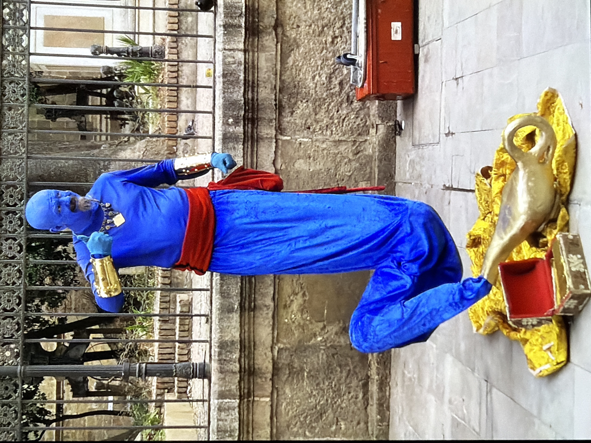 Mediterranean afternoon: street performers, coastal views, and local life