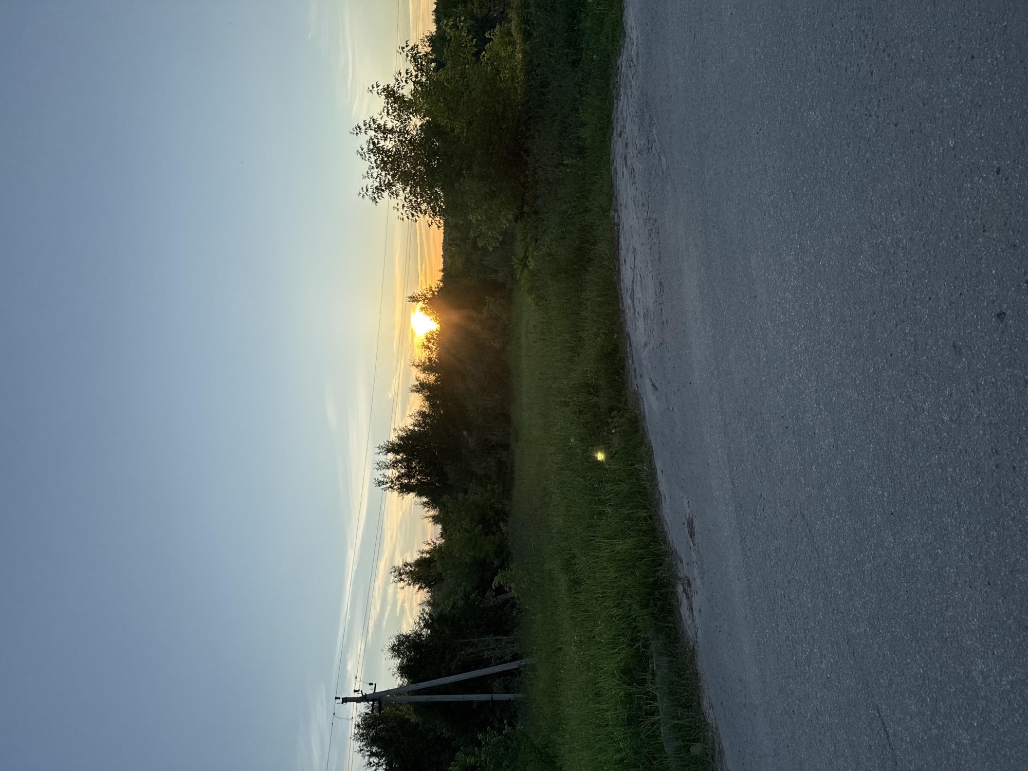 Evening walk documented through Russian village streets during sunset