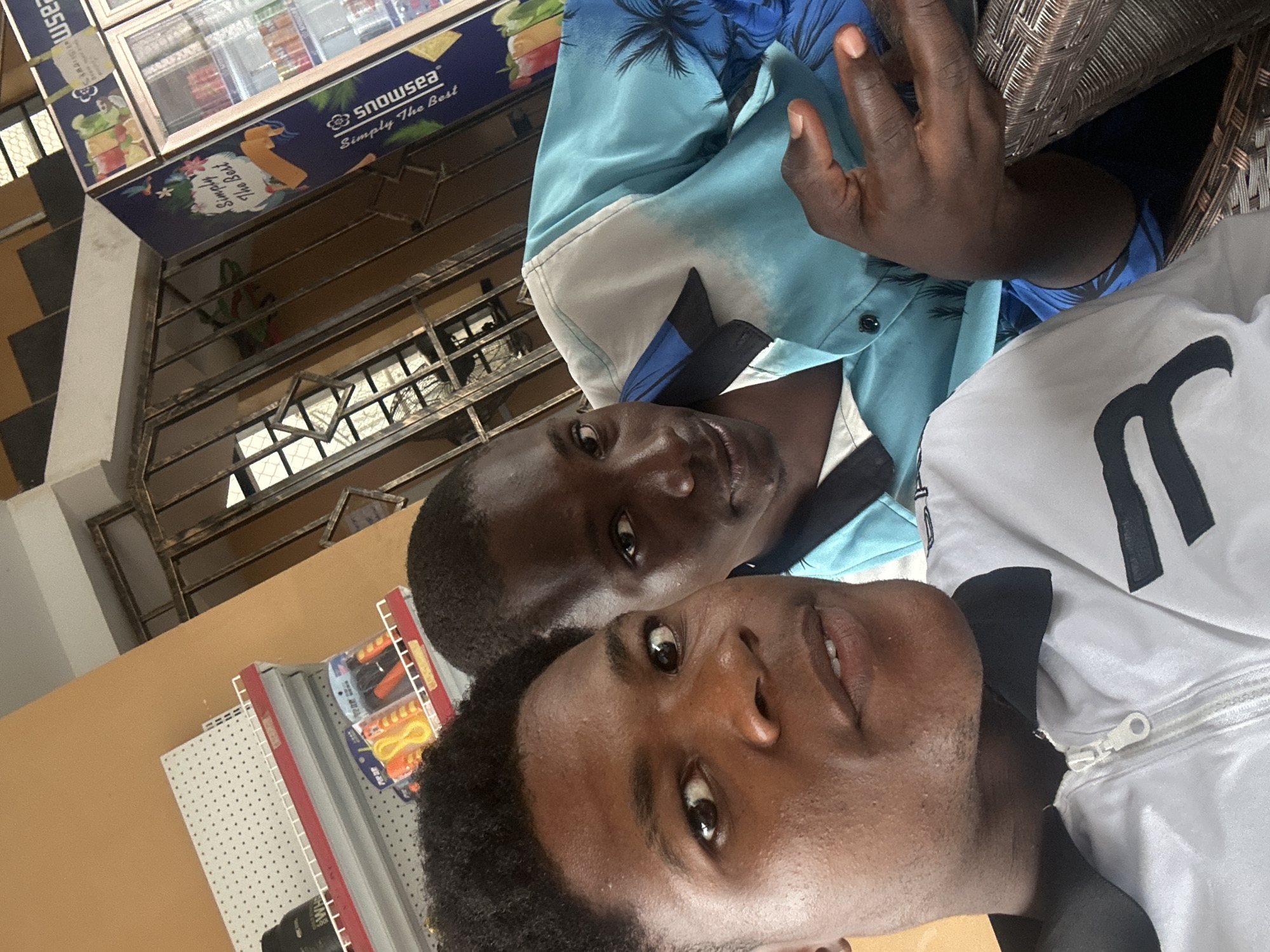 Young men enjoy pool games and social time in Ihiagwa