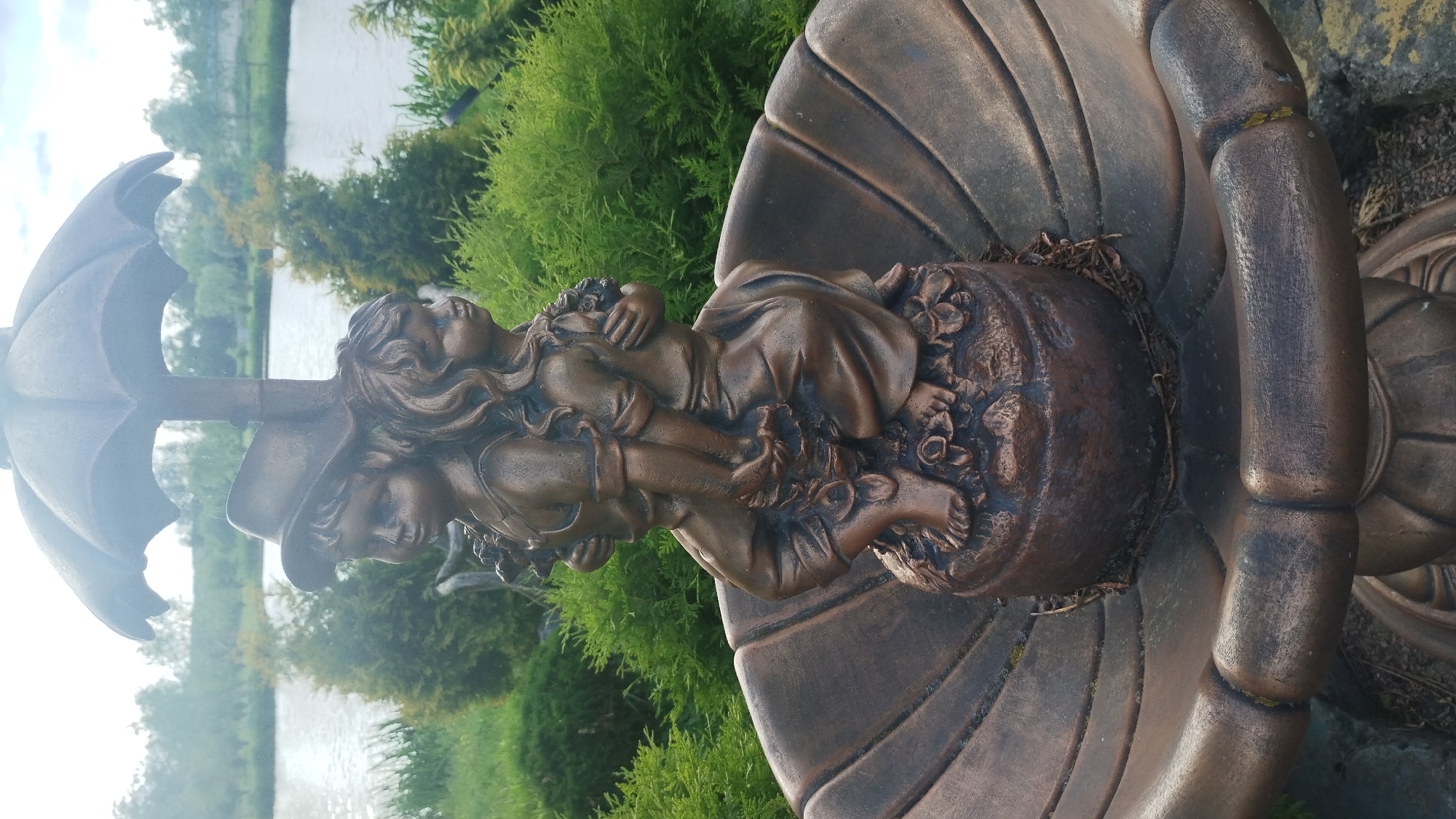 Visitor documents public art and swans in Khmilnyk, Ukraine