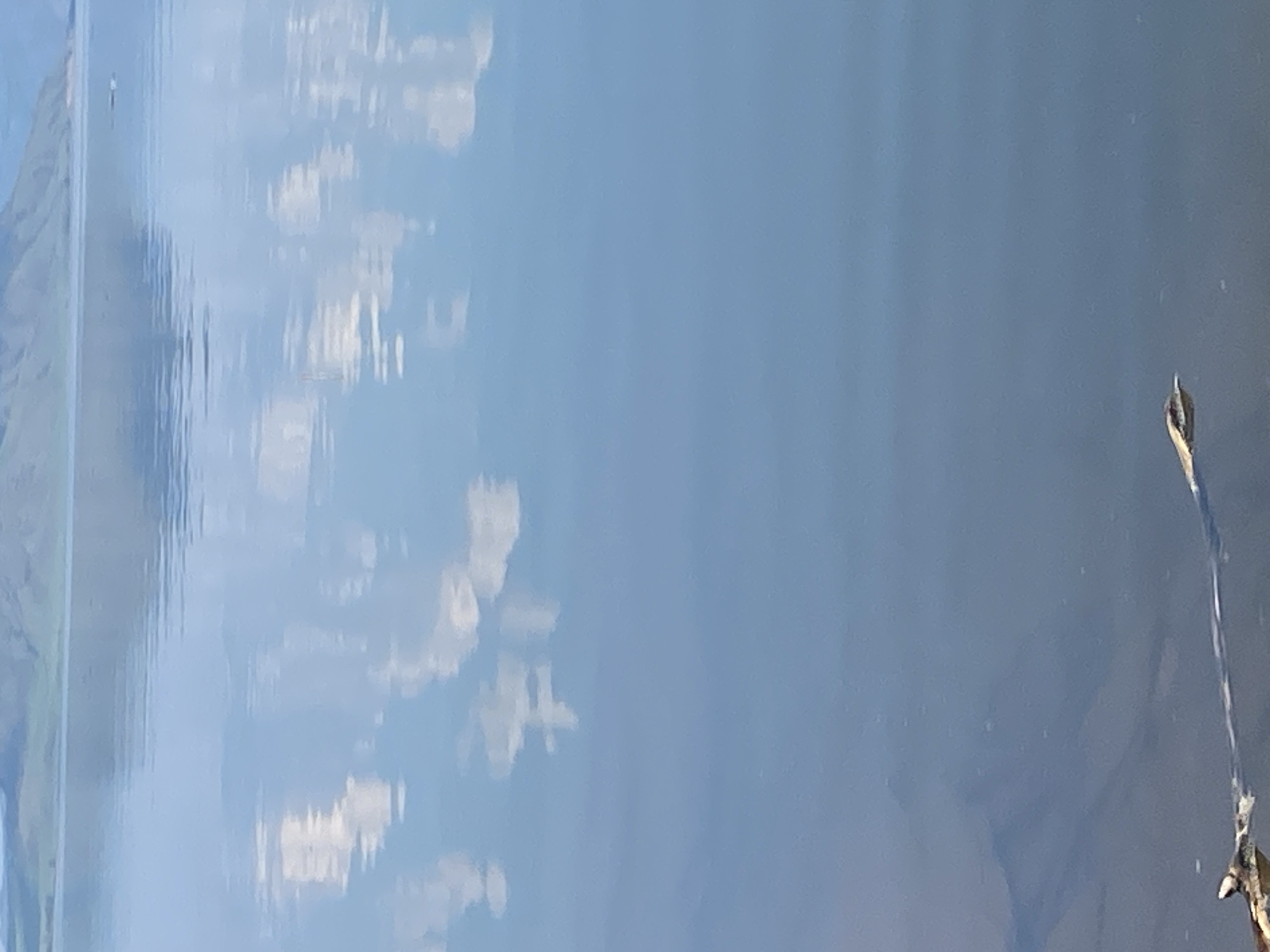 Calm water with submerged object observed near Ust'-Erba, Russia