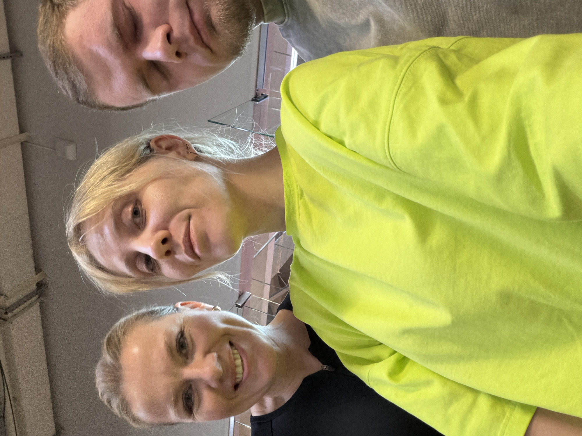 Three people pose for selfie in Chaikovsky, Russia